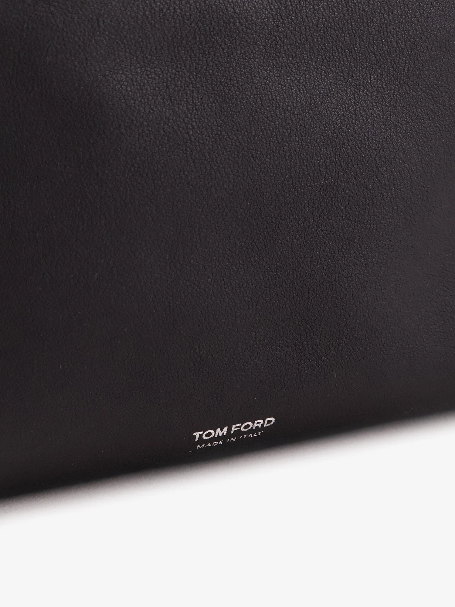 Leather shopping bag with logo lettering on the bottom.webp