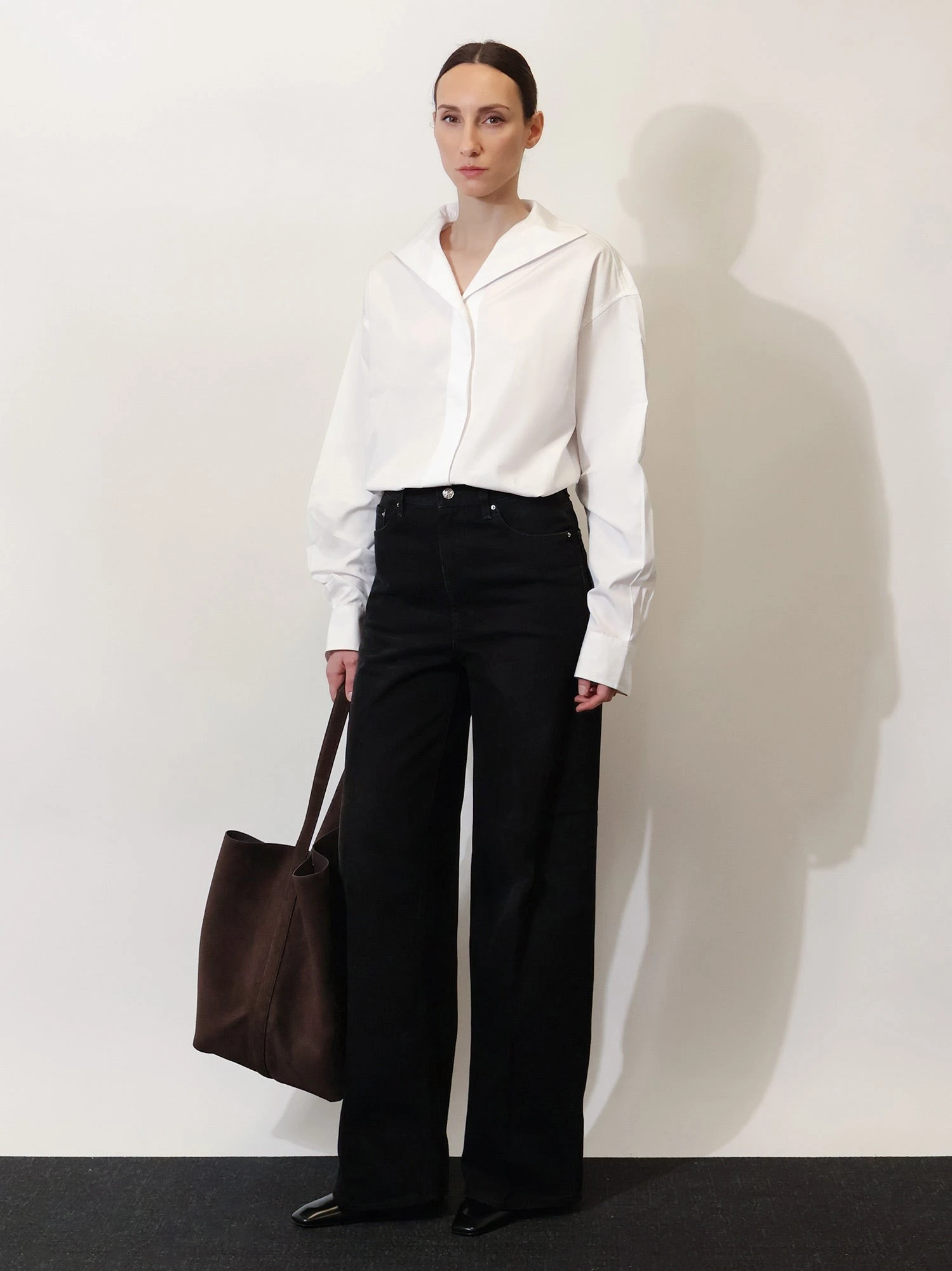 Black denim jeans.webp