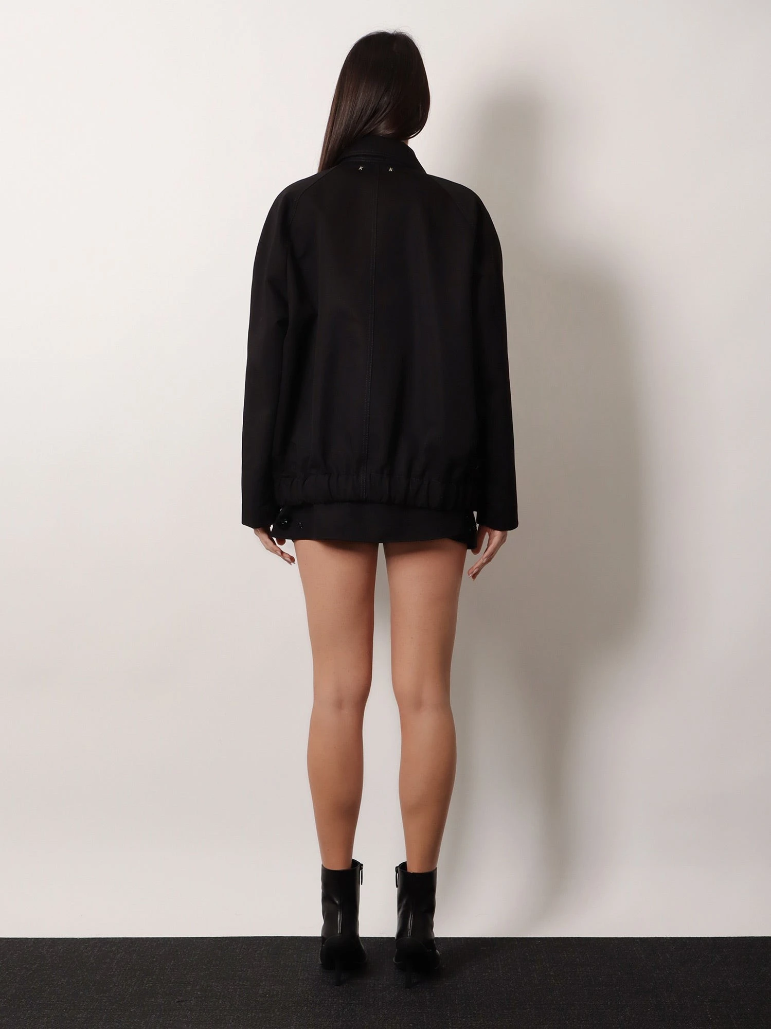 Black denim jacket with floral details in sequins and crystals.webp