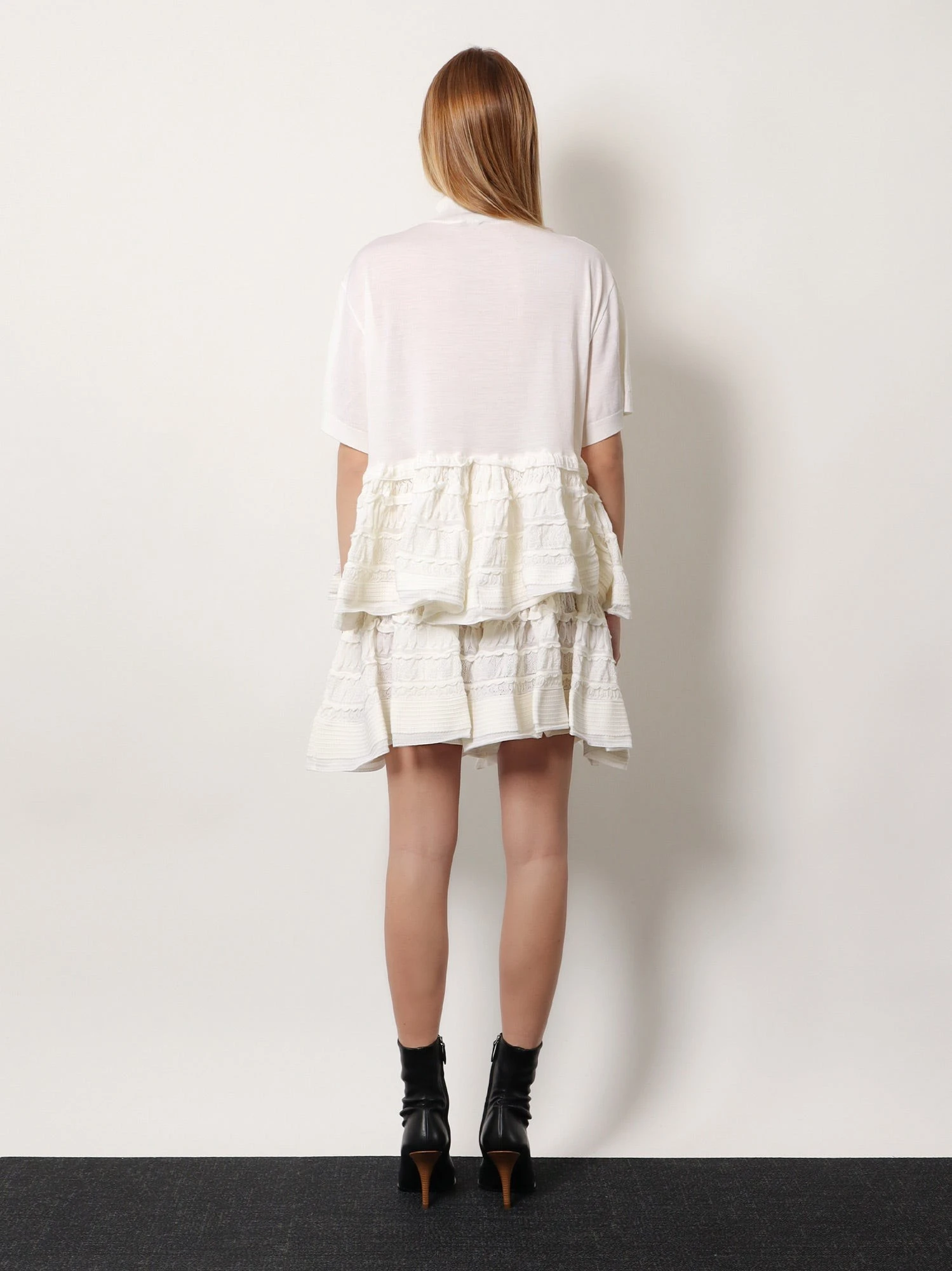 Peplum virgin wool sweater.webp