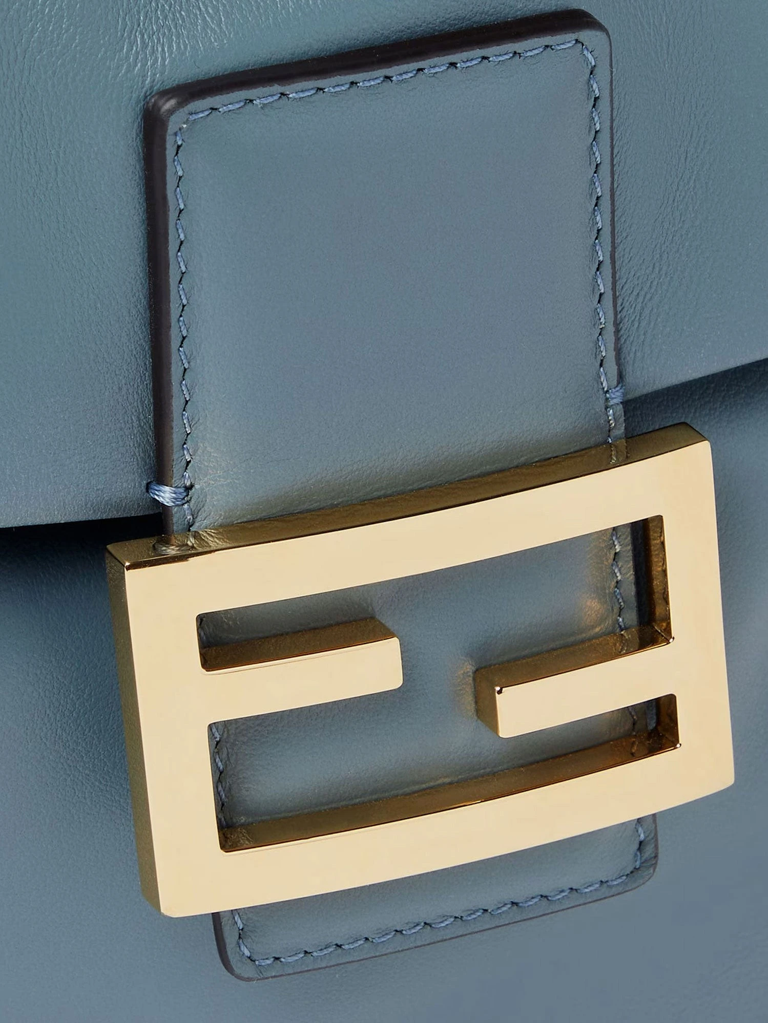 Leather backpack with metal FF logo detail.webp