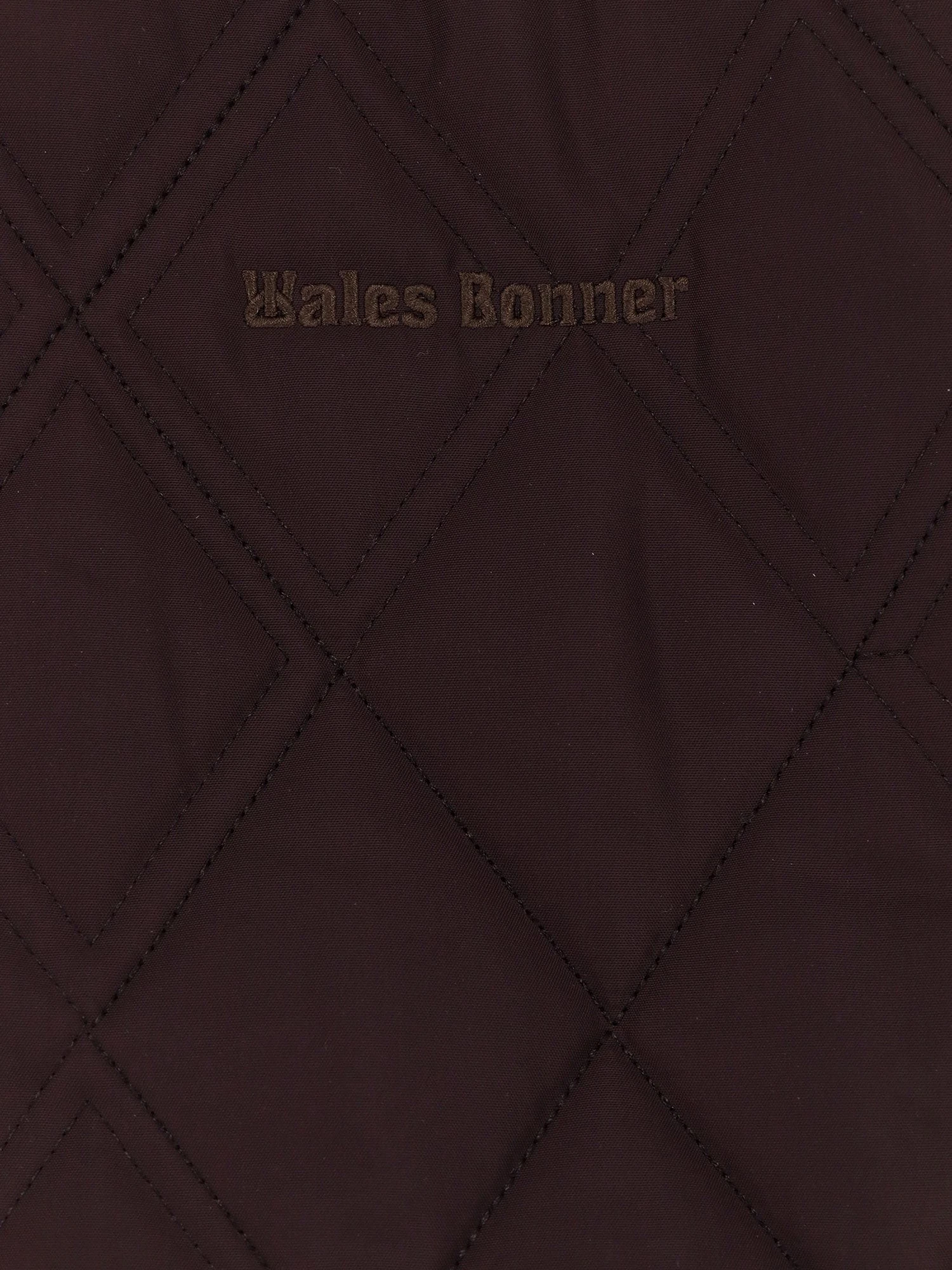 Nylon down jacket with iconic side stripes.webp