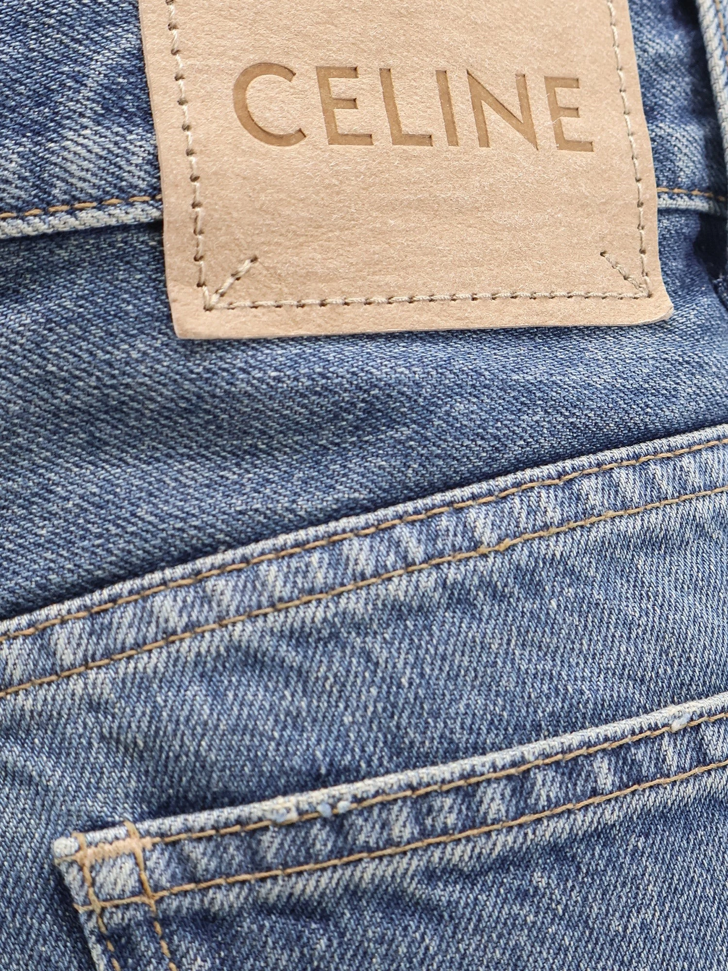 Stone-washed cotton jeans.webp