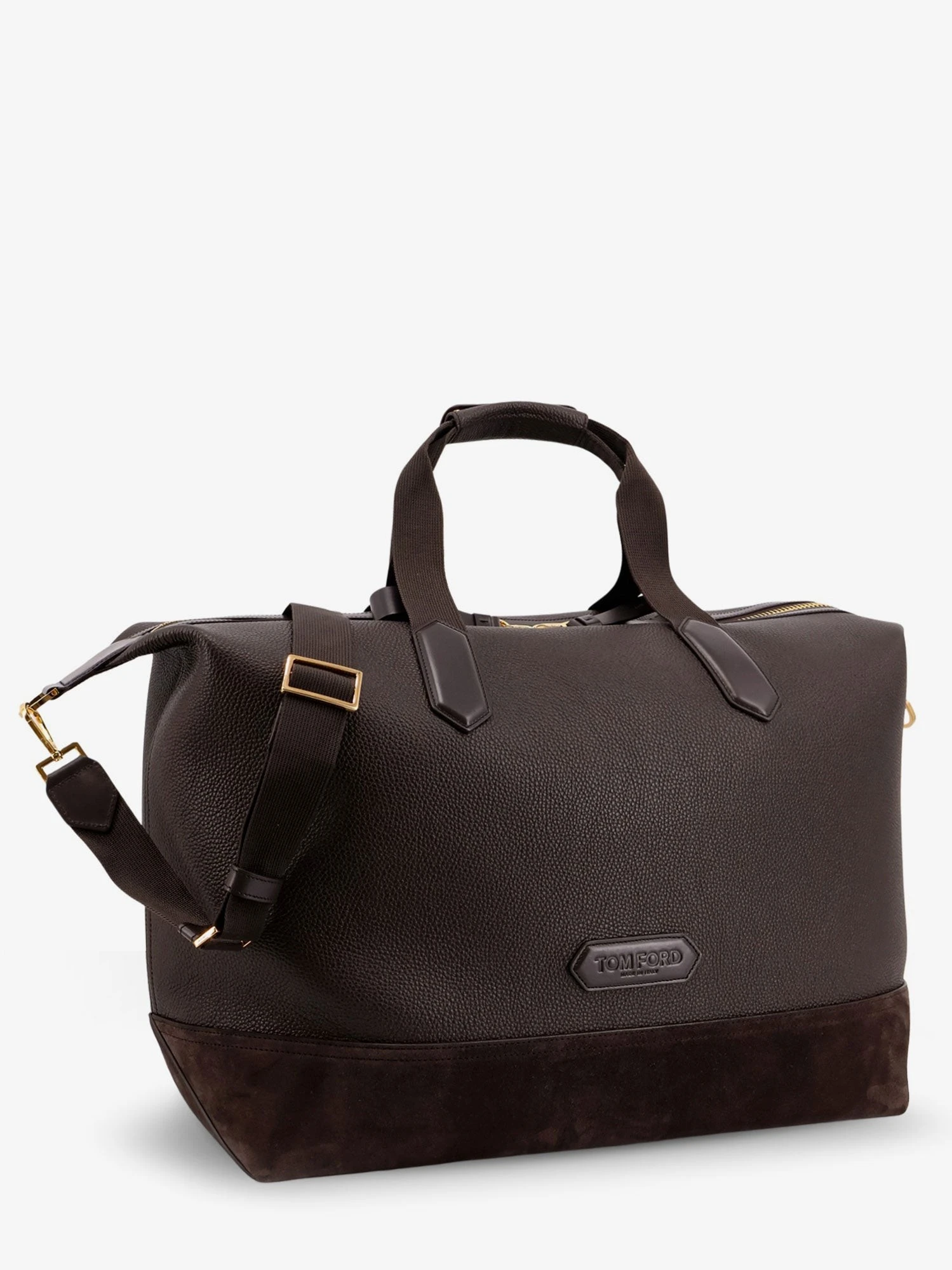 Leather travel bag with suede inserts.webp