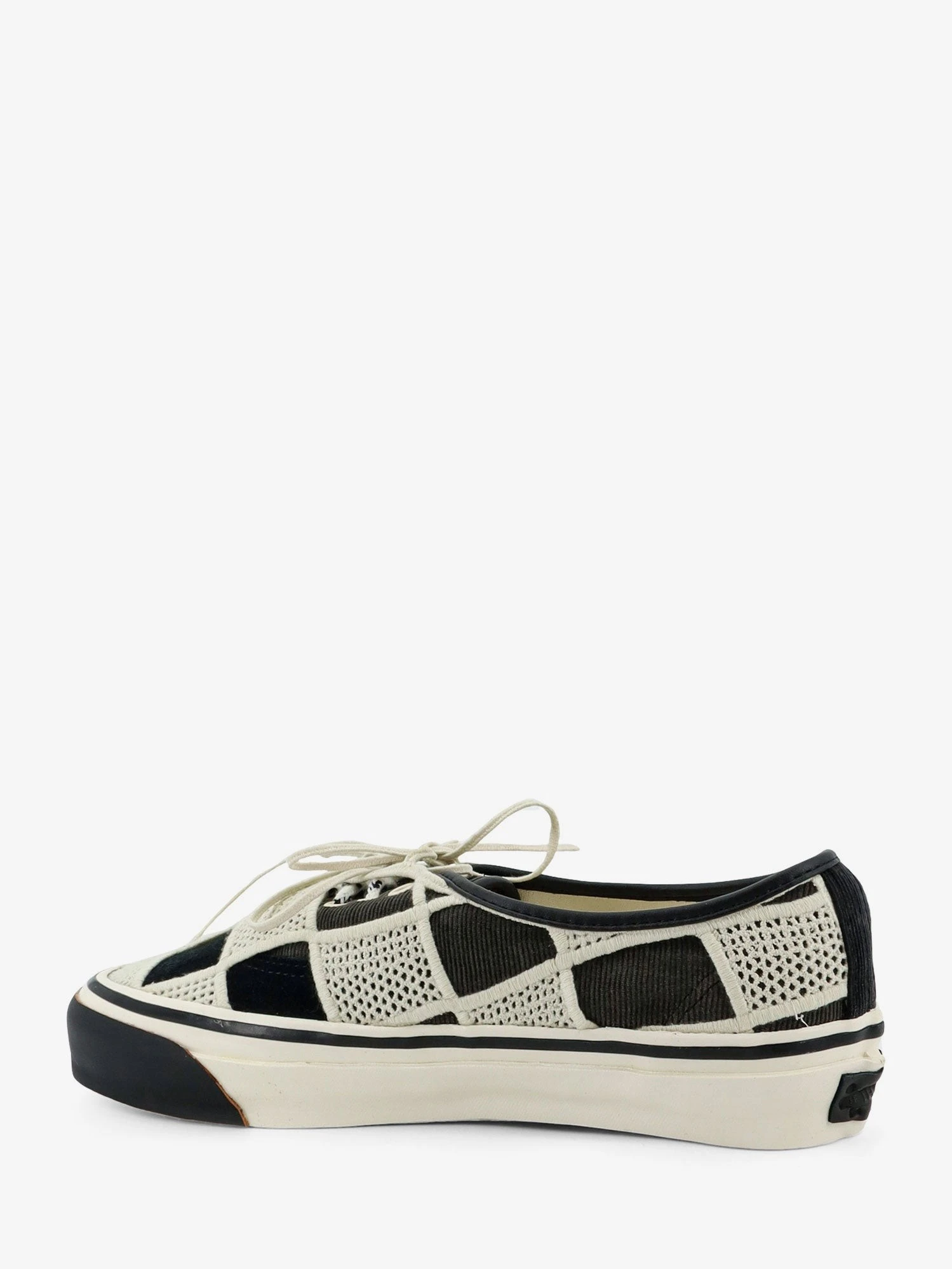 Lx authentic 44 sneakers with Shell Knit motif.webp