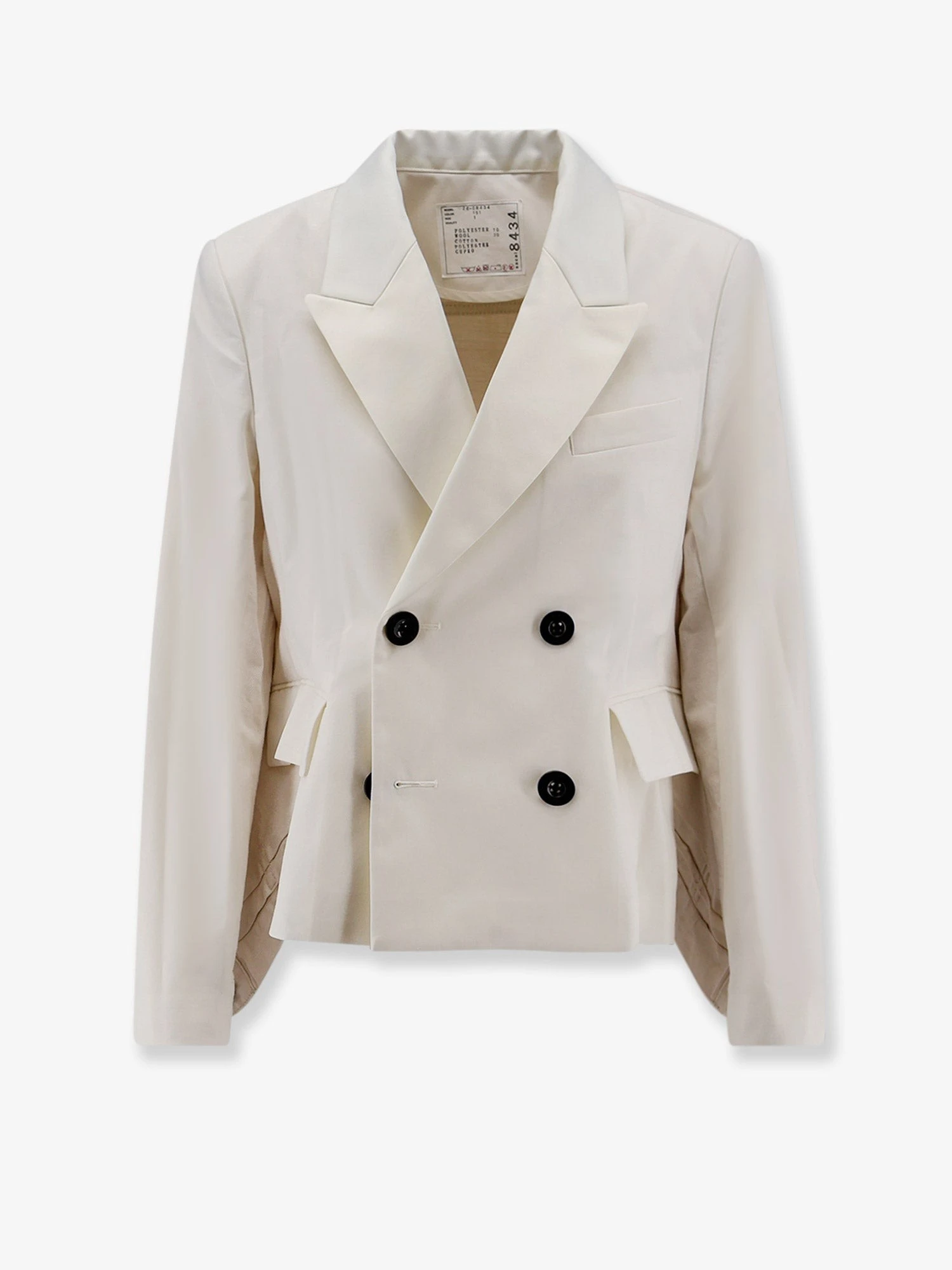 Blazer with white denim insert on the back.webp