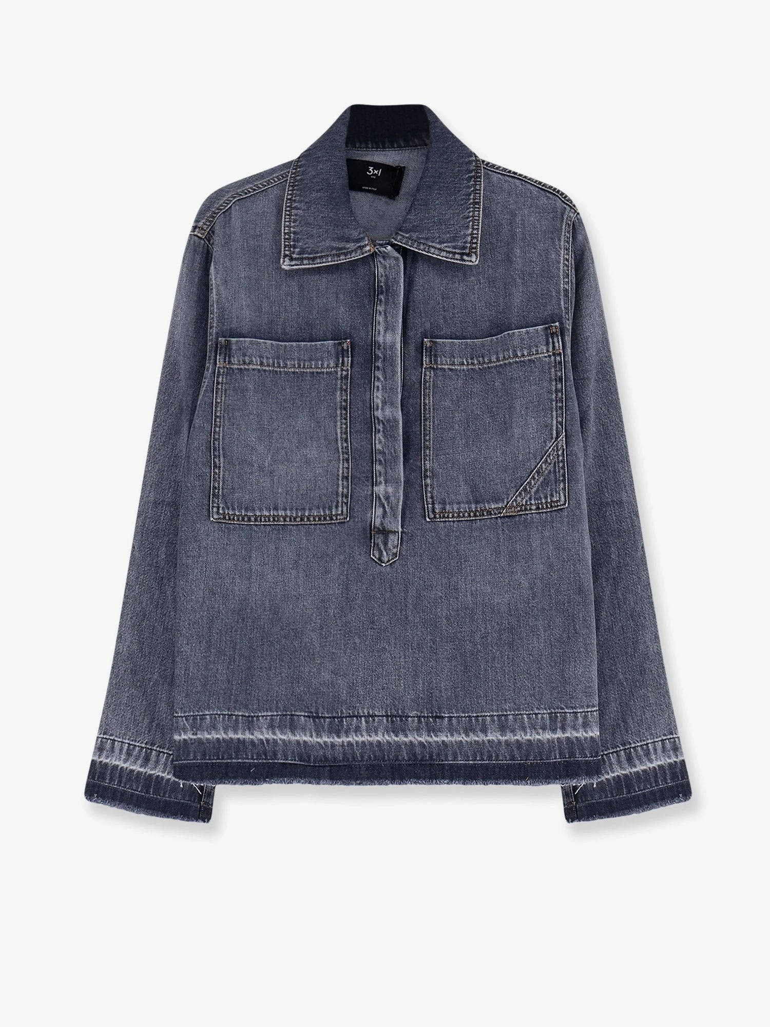 Denim shirt with frayed edges.webp