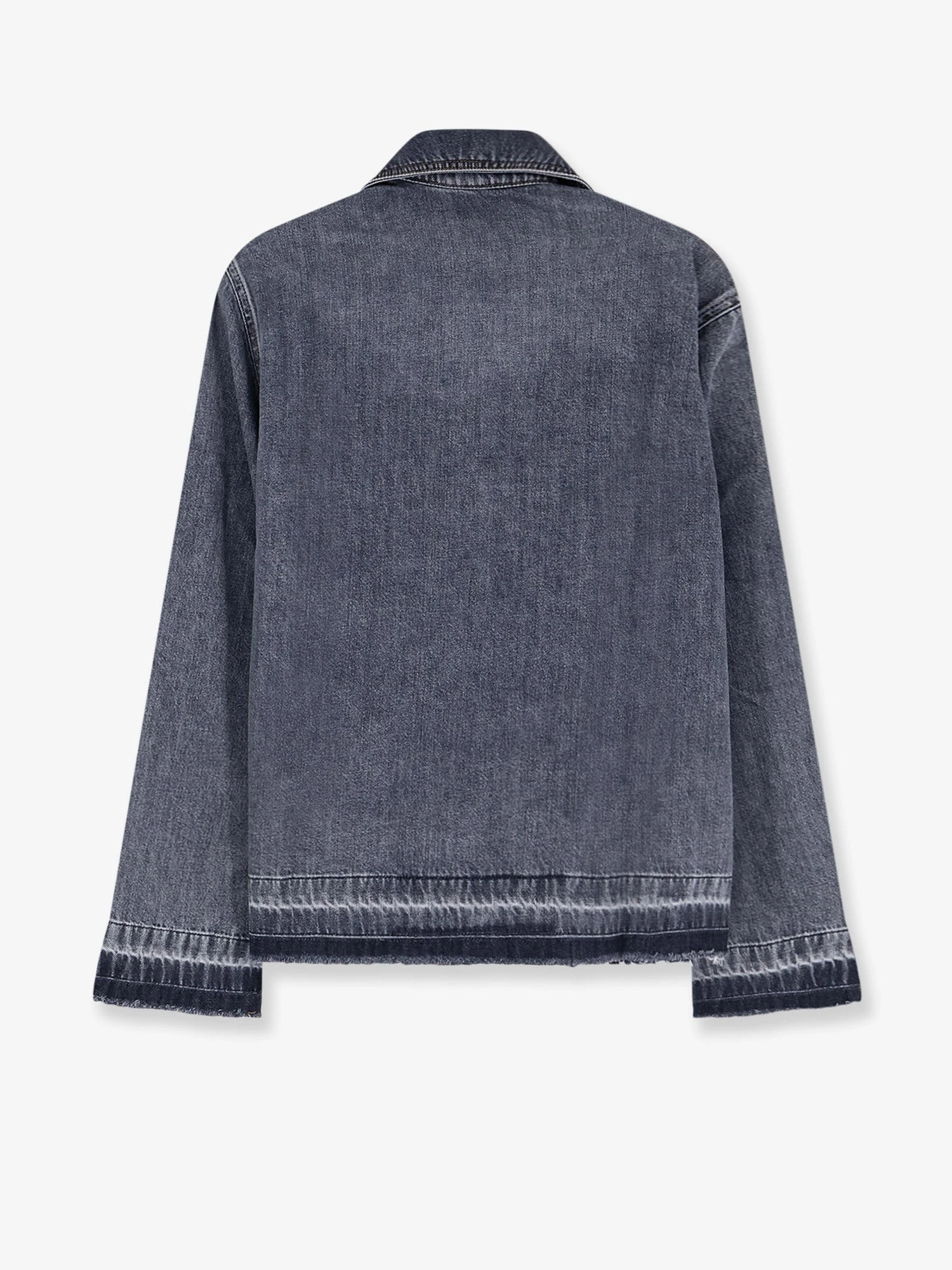 Denim shirt with frayed edges.webp