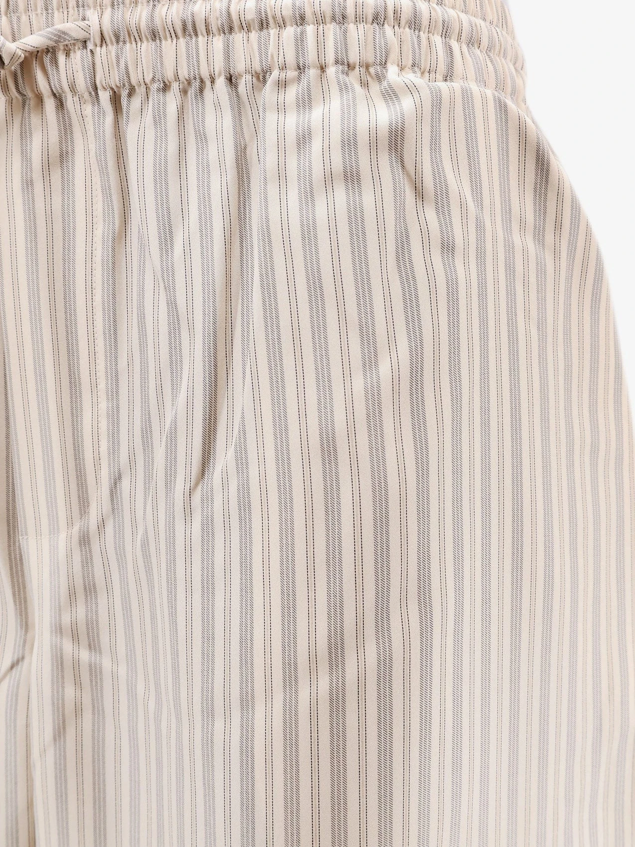 Silk striped trousers.webp