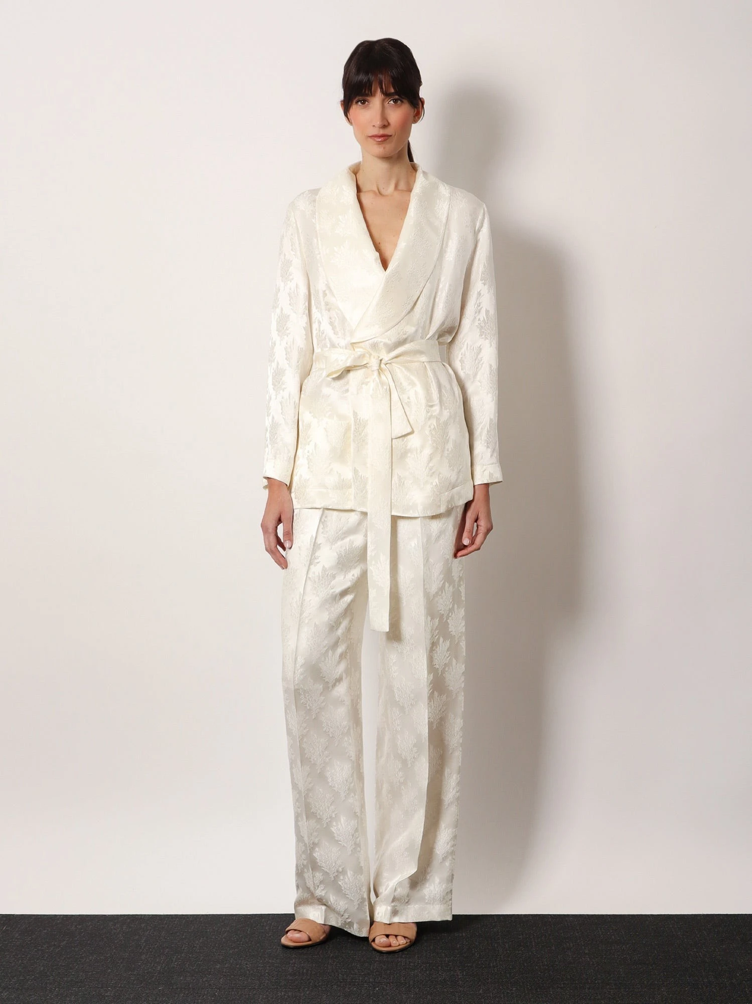 Jacquard silk trousers with floral motif.webp