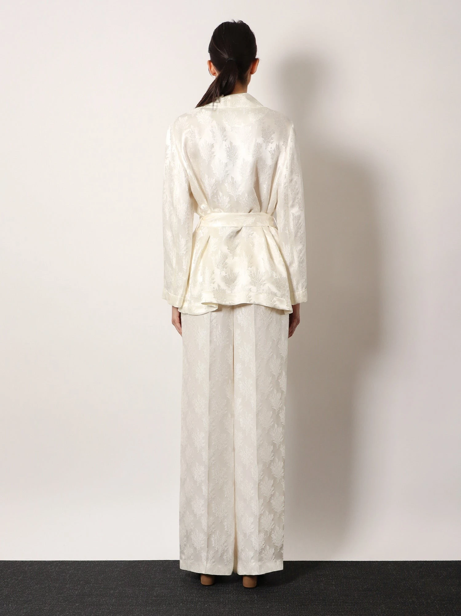 Jacquard silk trousers with floral motif.webp