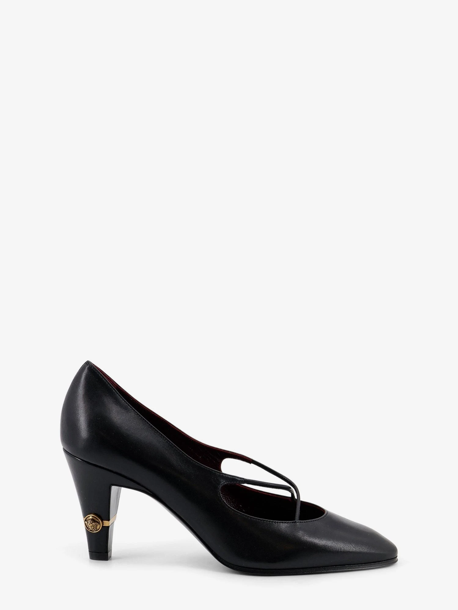 Criss-Cross Medallion leather pumps.webp