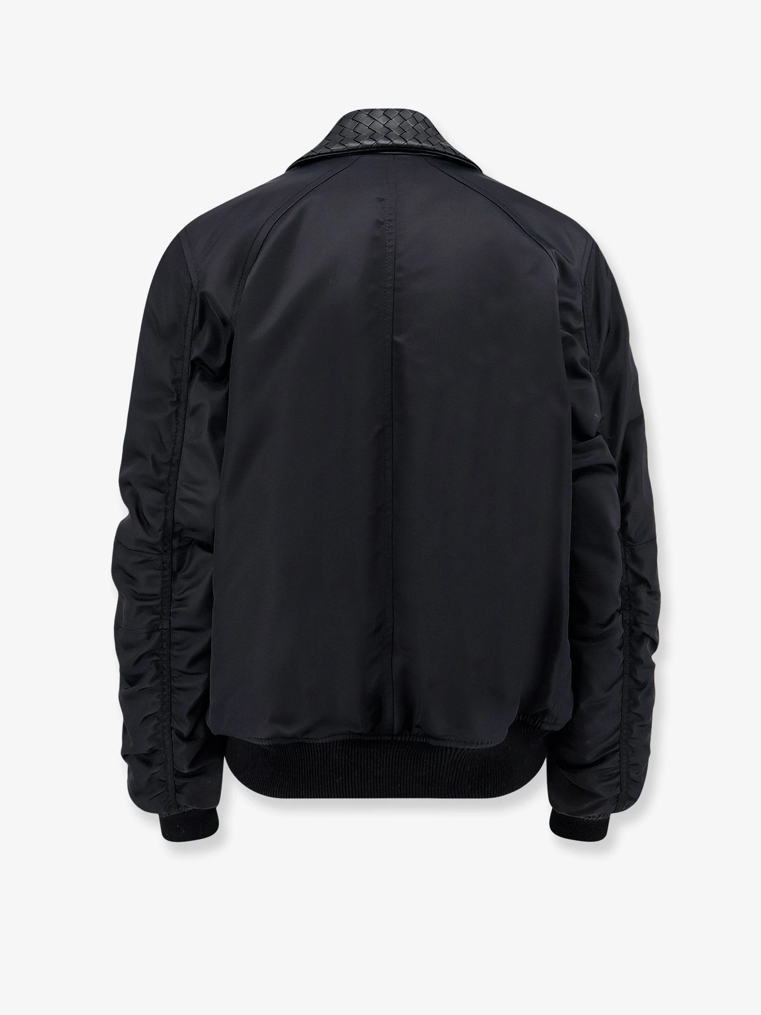 Nylon jacket with Intrecciato leather collar.webp