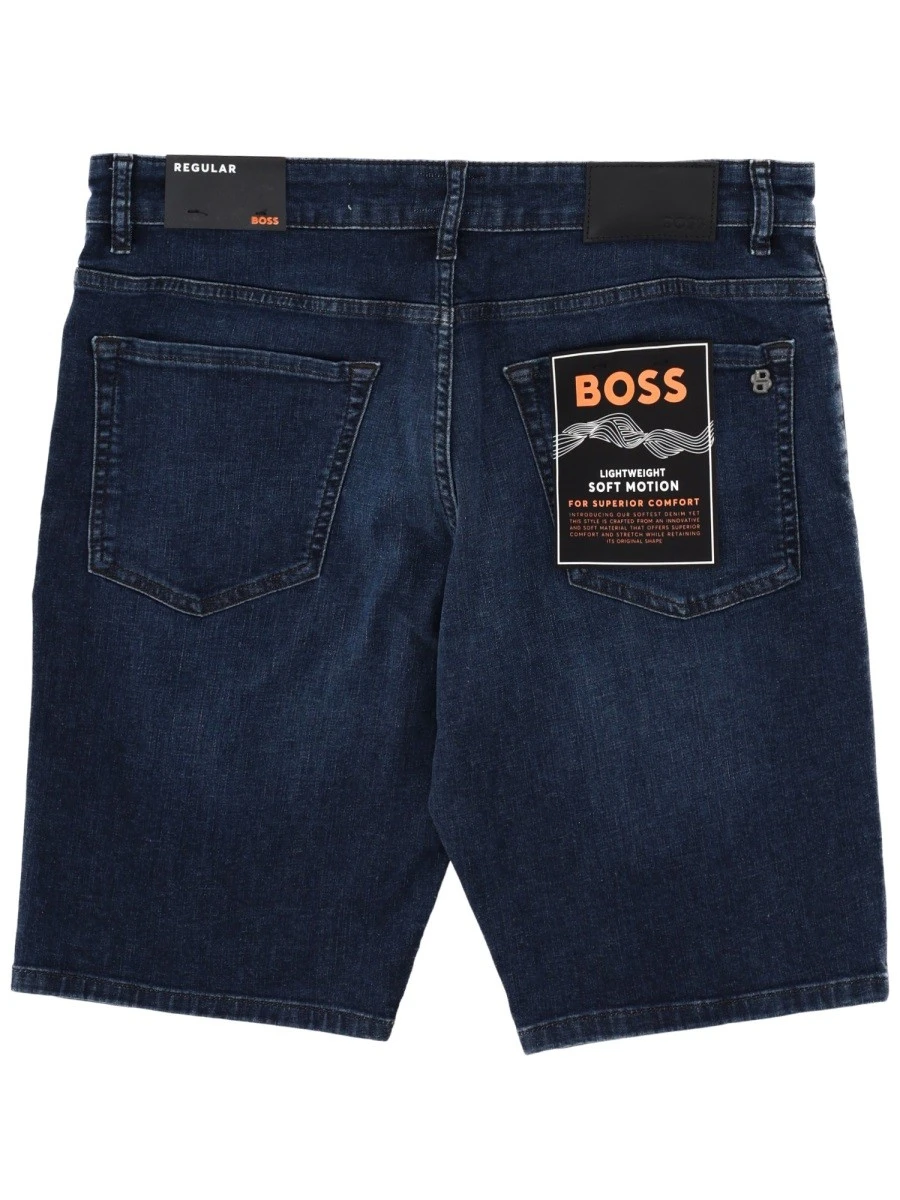 SHORTS CON PATCH LOGO.webp