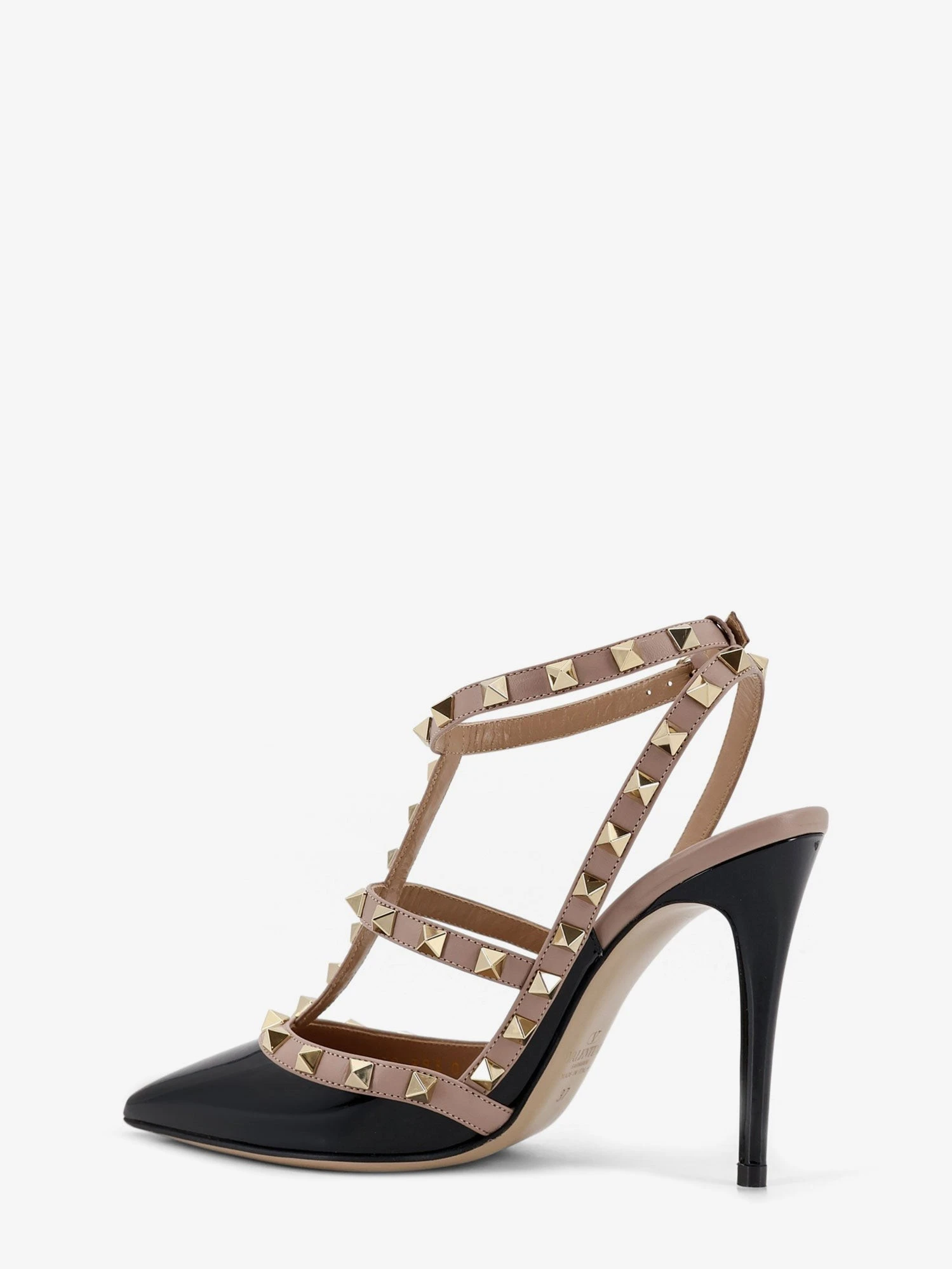 Rockstud patent leather pumps with iconic studs.webp