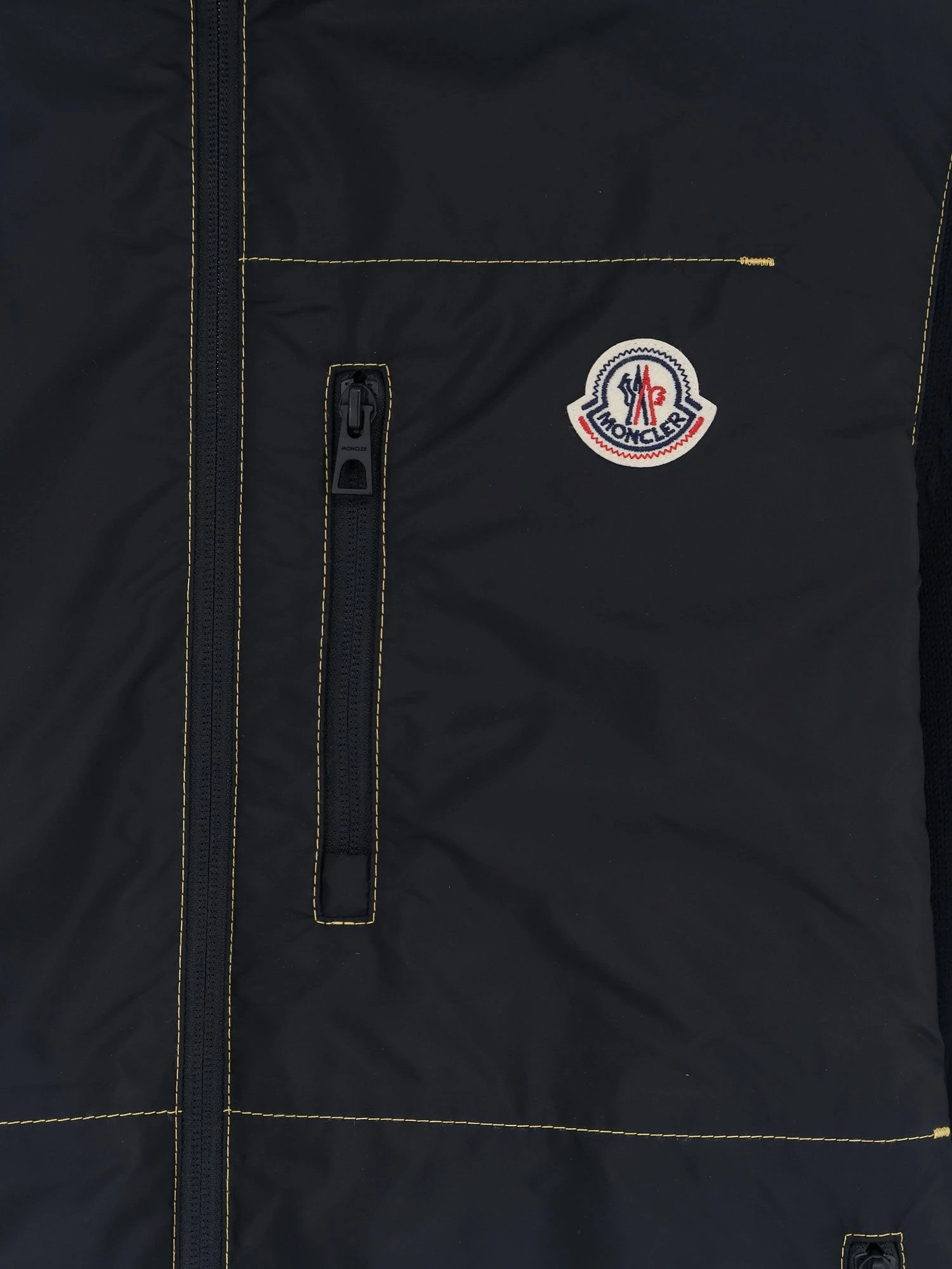 Nylon jacket with cotton inserts.webp