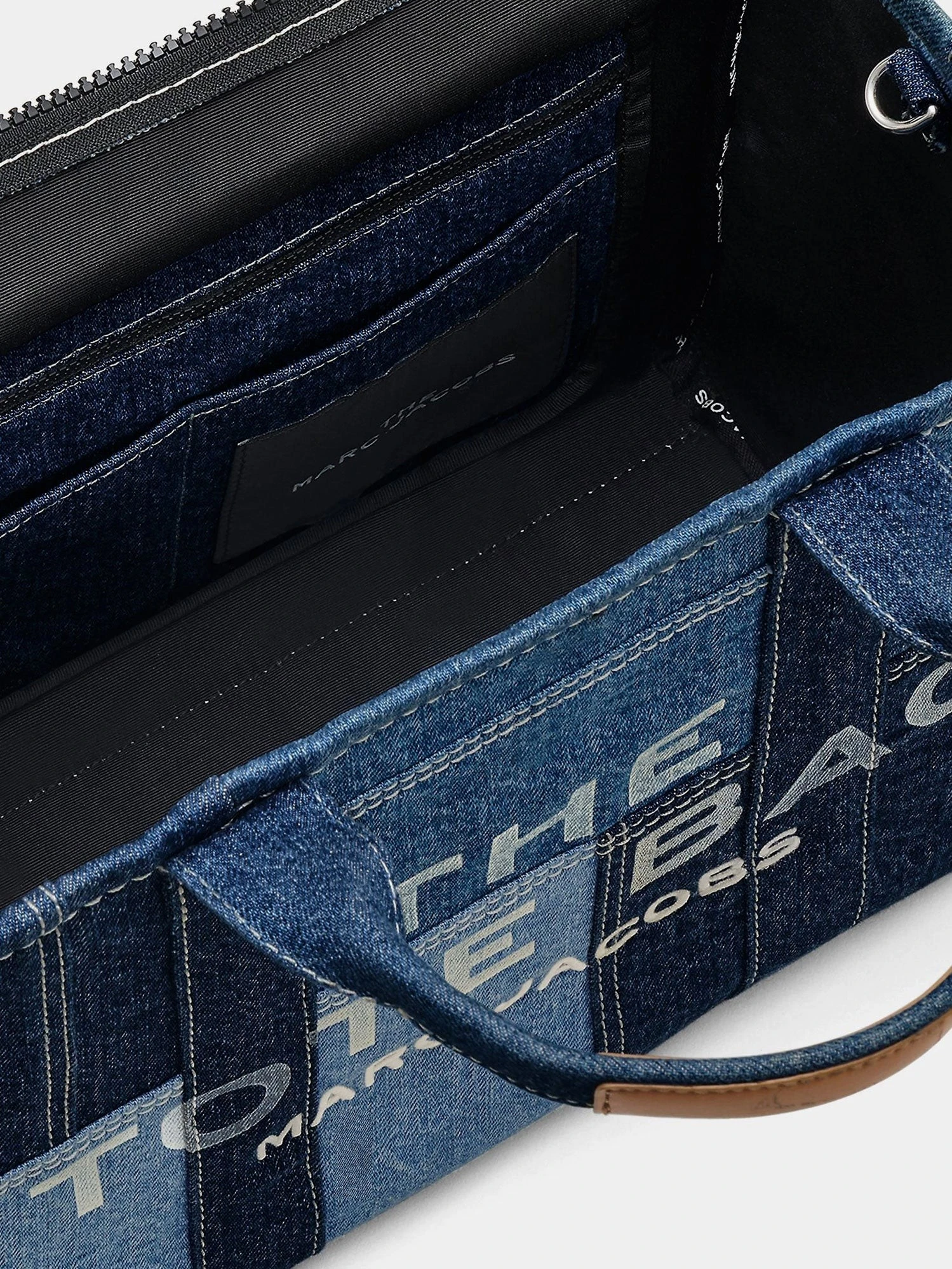 The denim Medium handbag with front logo print.webp