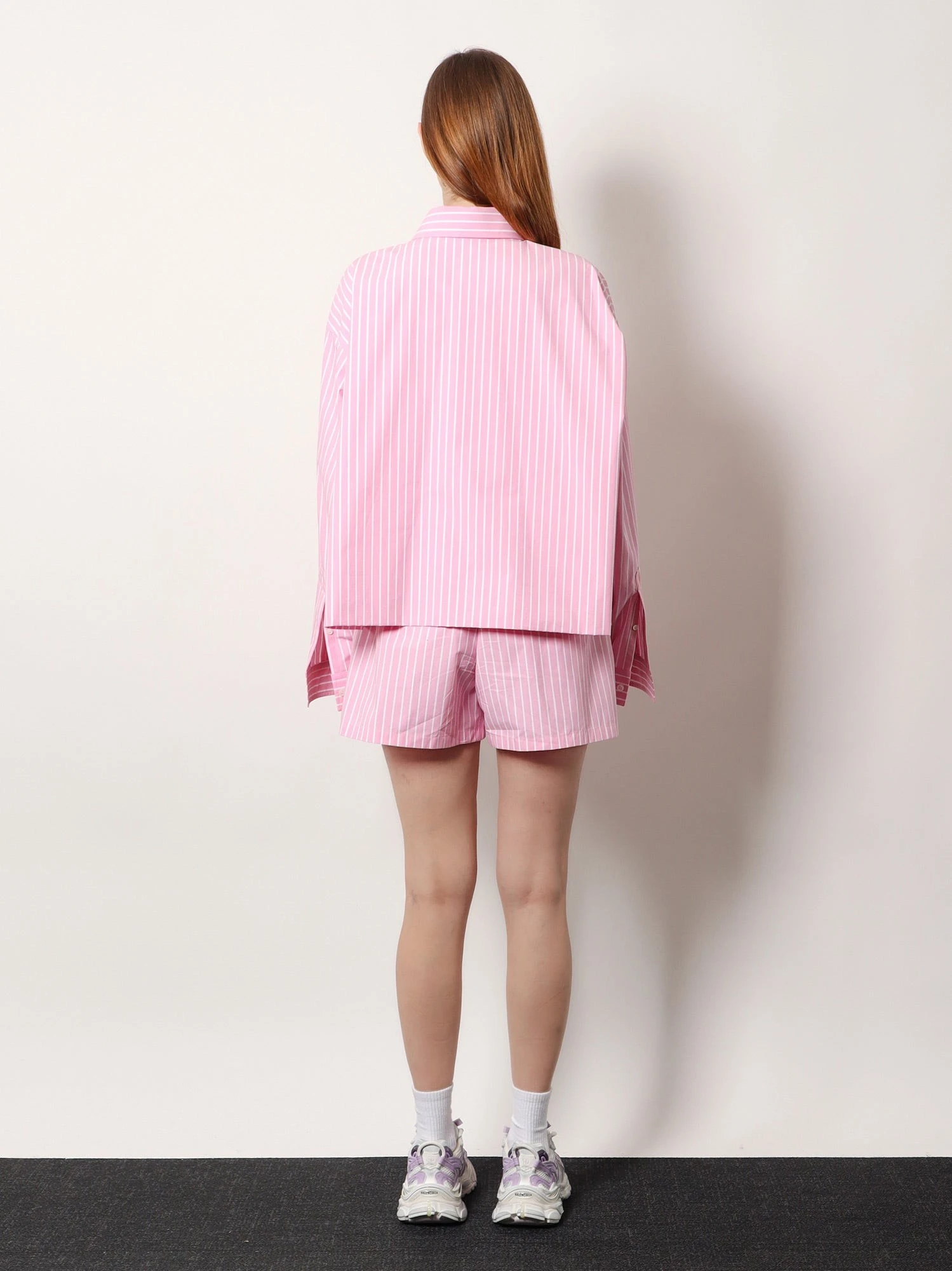 Folded striped cotton shirt.webp