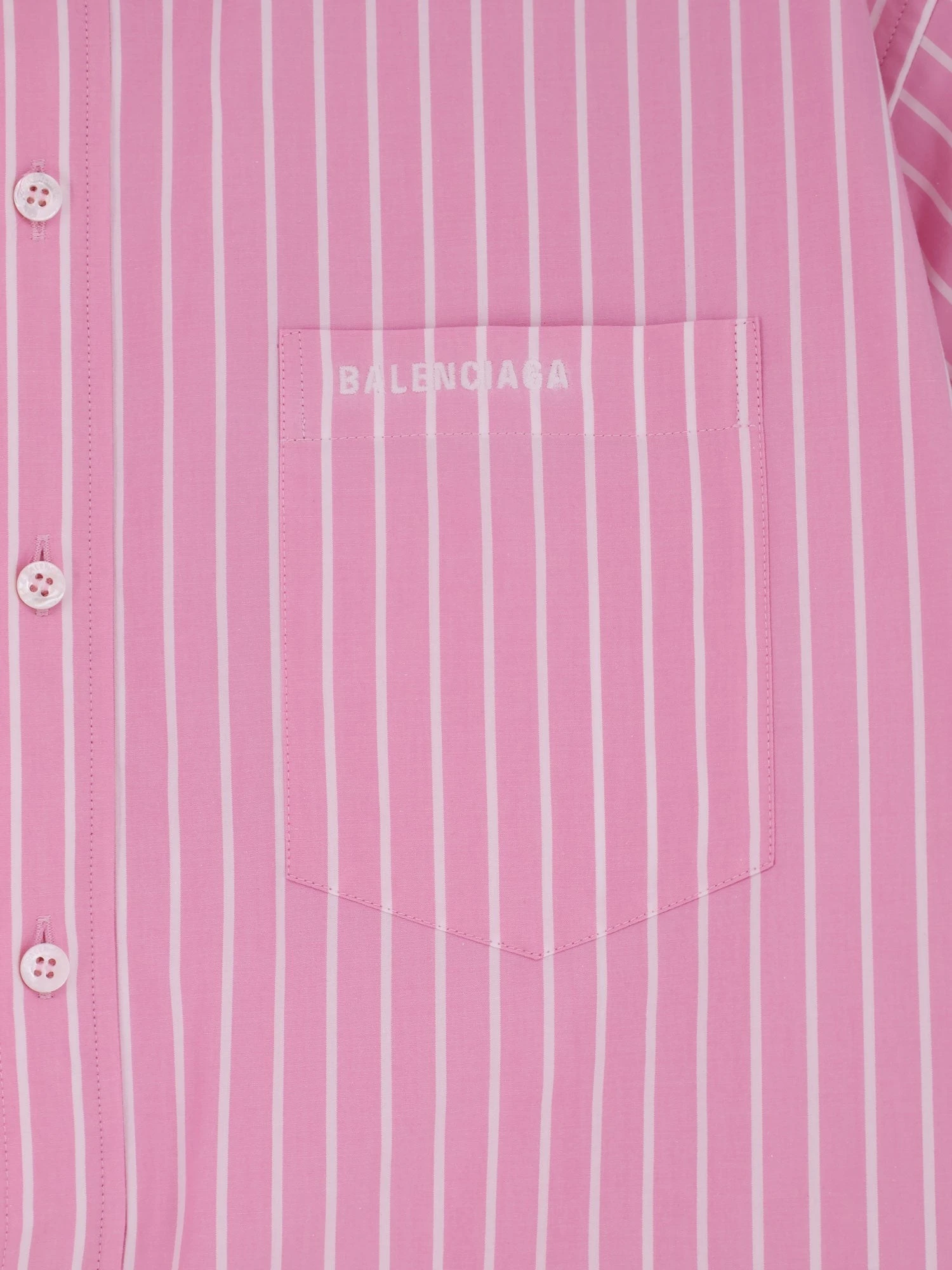 Folded striped cotton shirt.webp