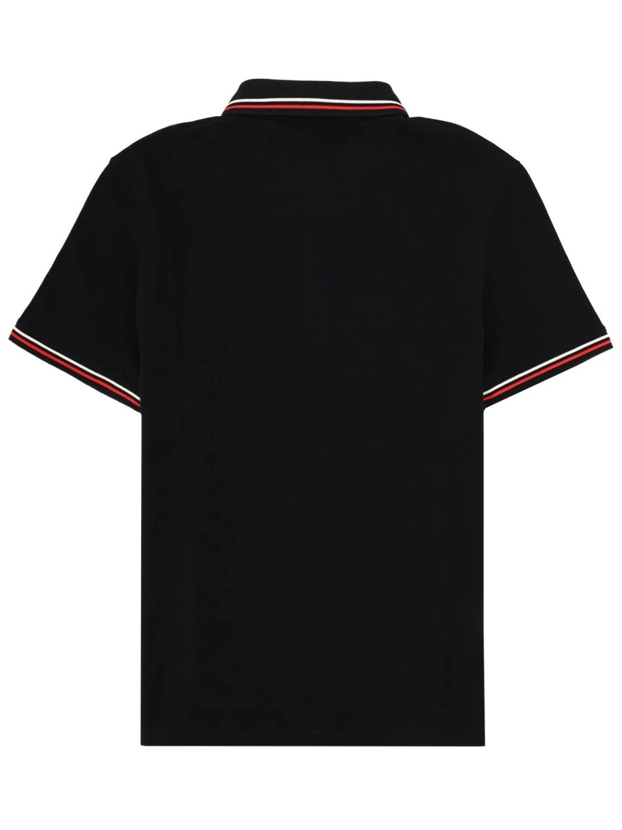 POLO CON PATCH LOGO.webp