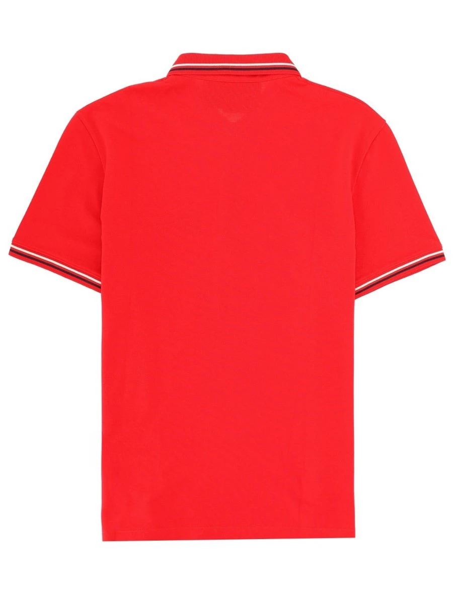 POLO CON PATCH LOGO.webp