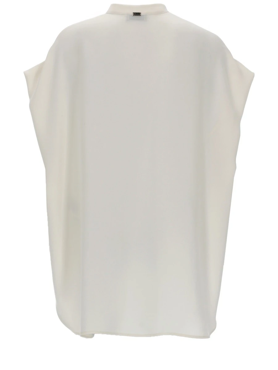BLUSA CON BOTTONI.webp