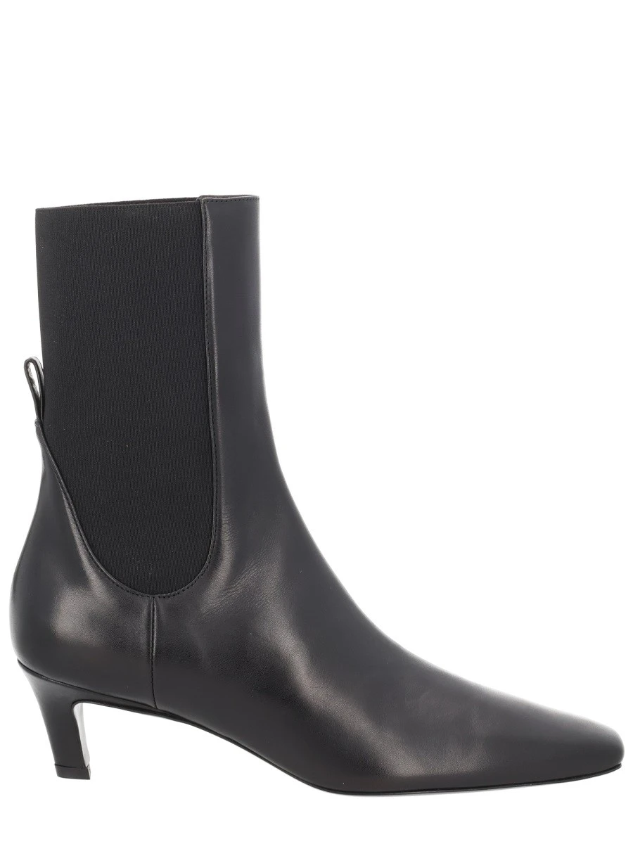 HEELED BOOT.webp