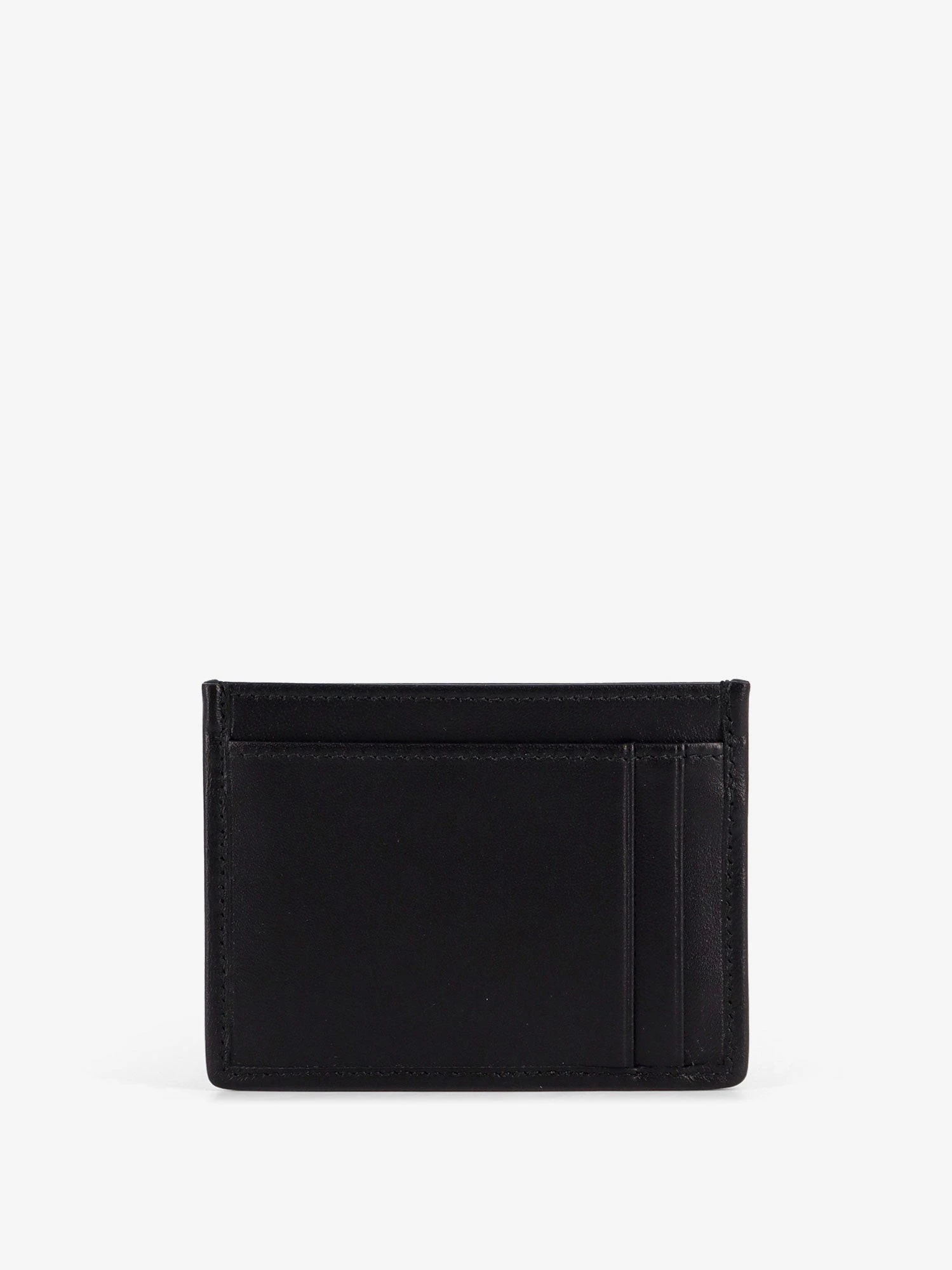 Quilted leather card holder with metal lettering logo.webp