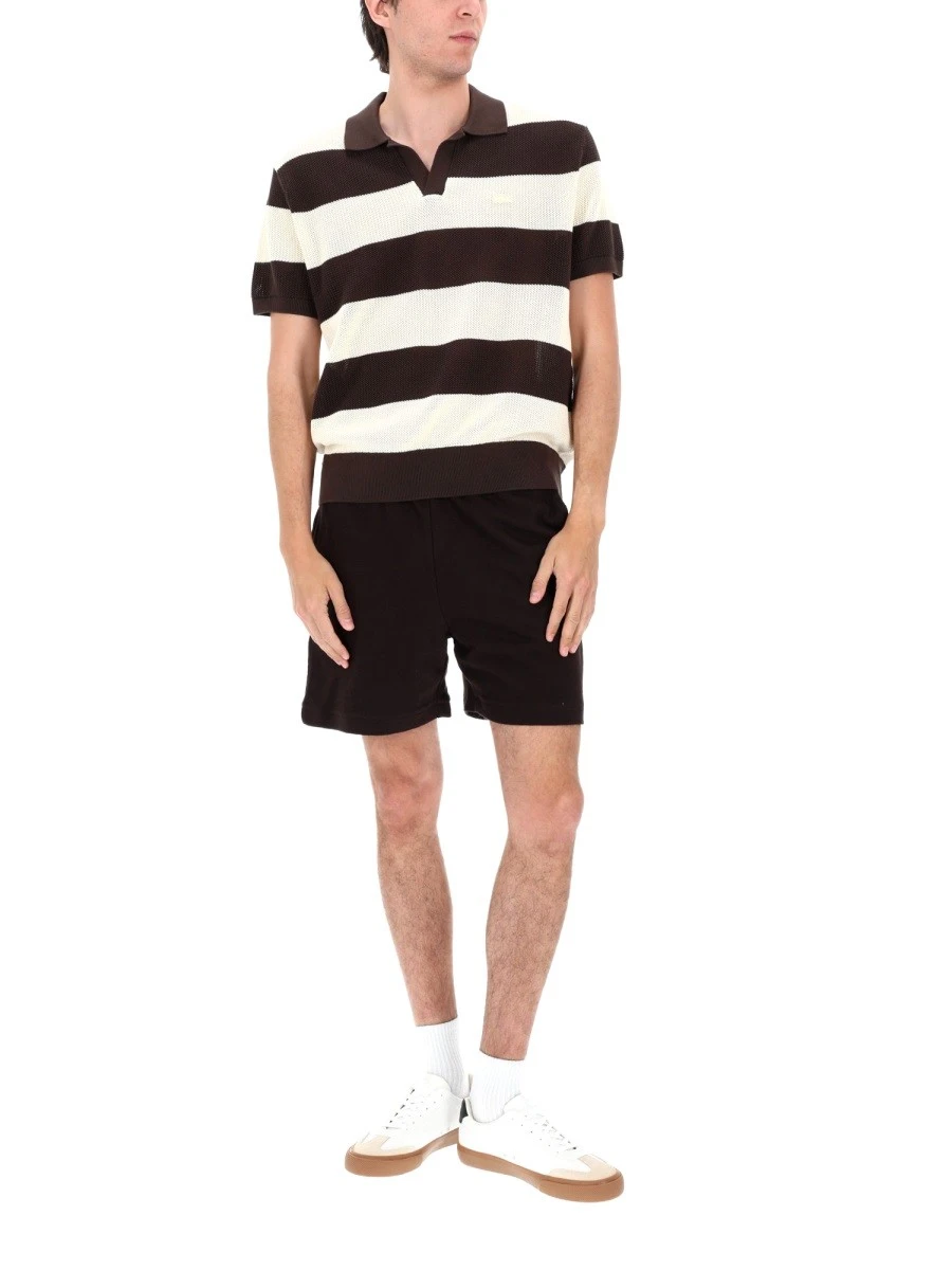 MAGLIA CON COLLO A POLO.webp