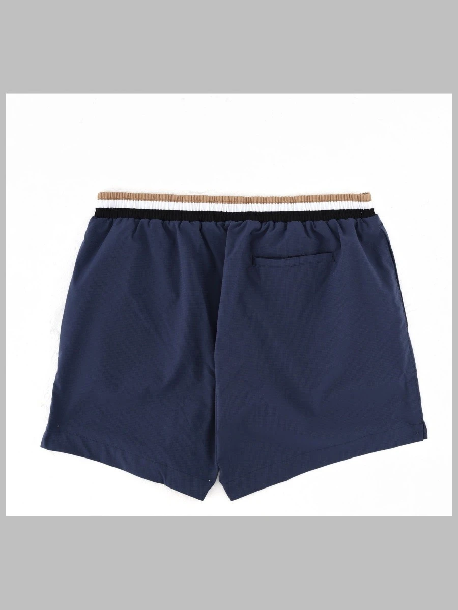 COSTUME DA BAGNO CON LOGO.webp