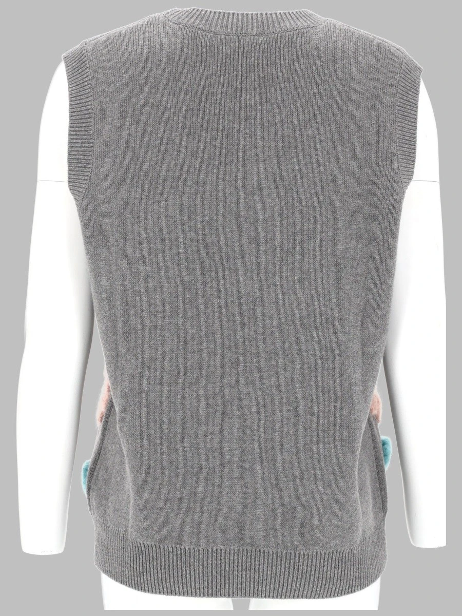 GILET CON APPLICAZIONI FLOREALI.webp