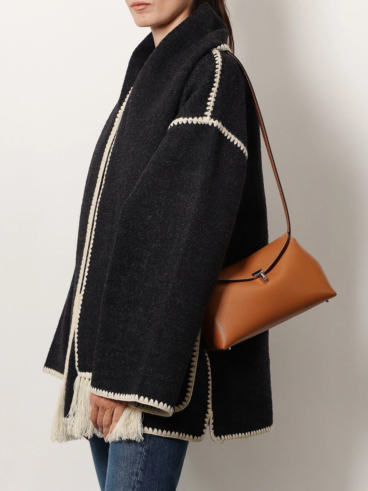 T-Lock leather clutch.webp