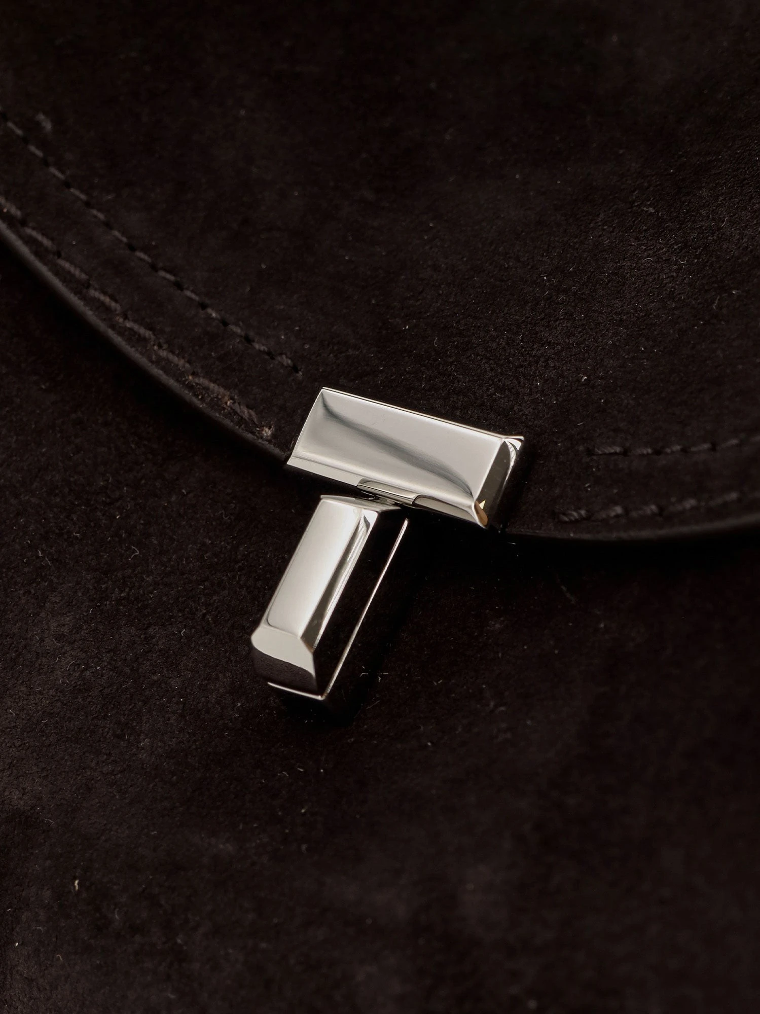 T-Lock suede handbag.webp