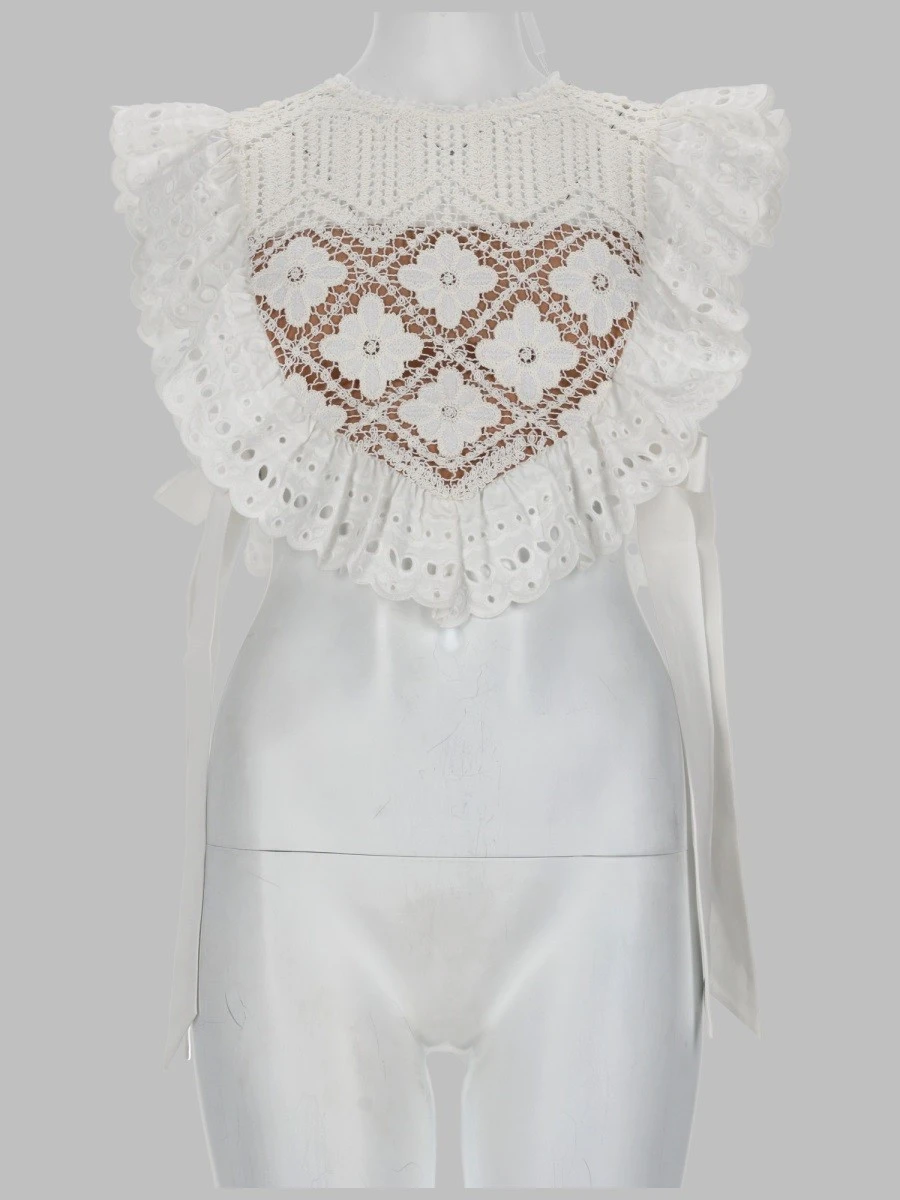 CROPTOP IN CROCHET CON INSERTI IN PIZZO.webp