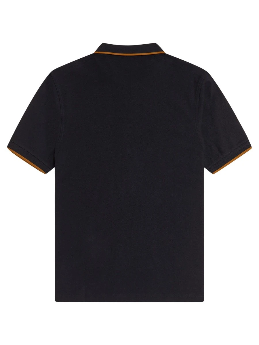 POLO CON ZIP E LOGO.webp