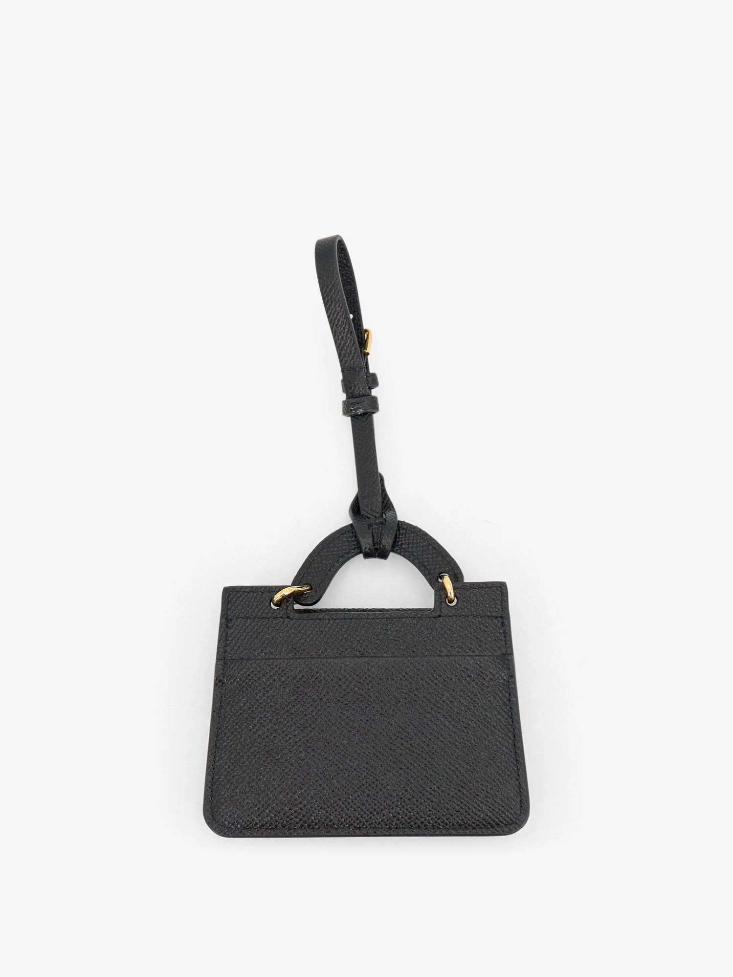 Hammered leather card holder with metal logo tag.webp