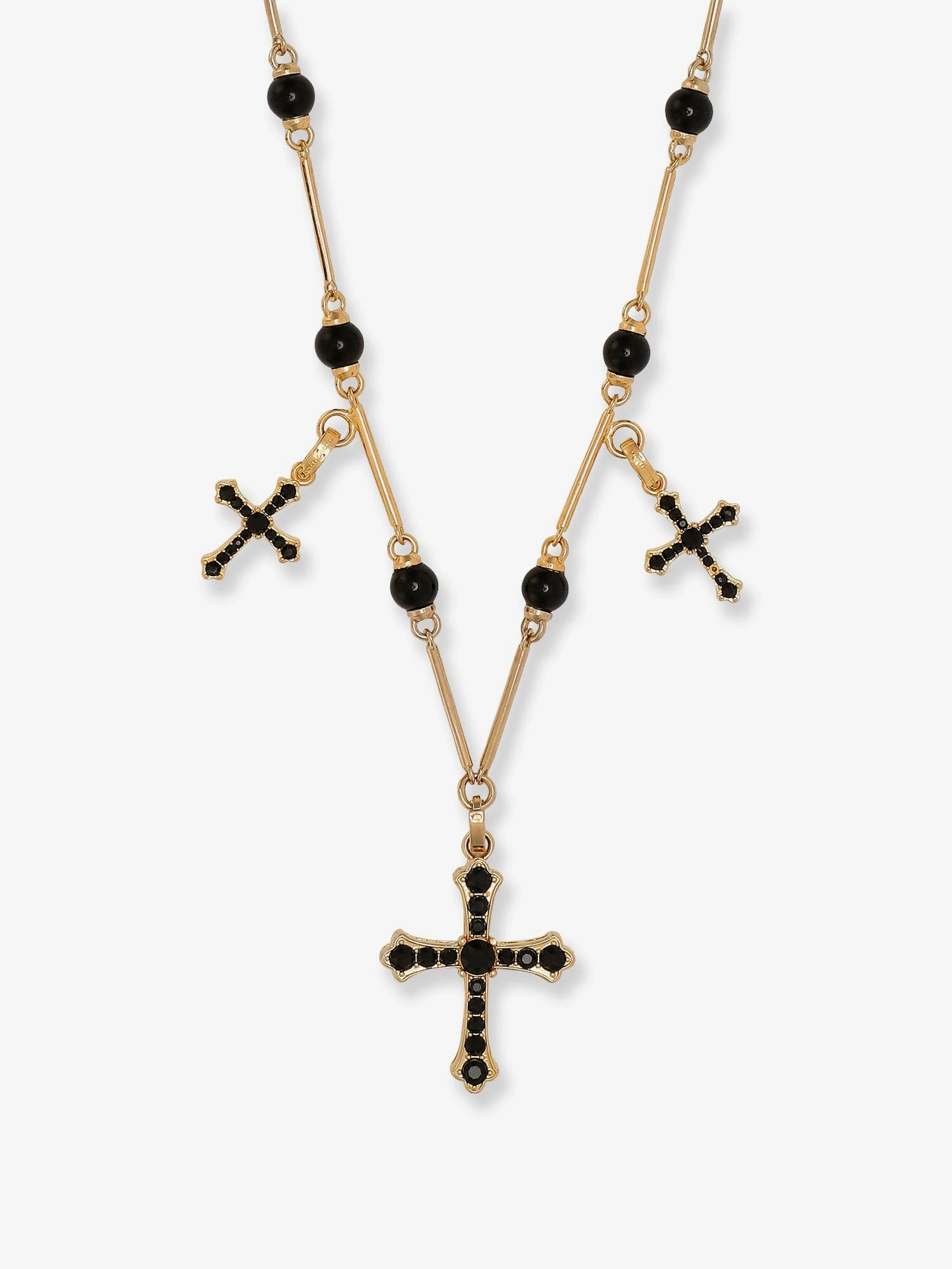 Brass rosary with cross charms.webp