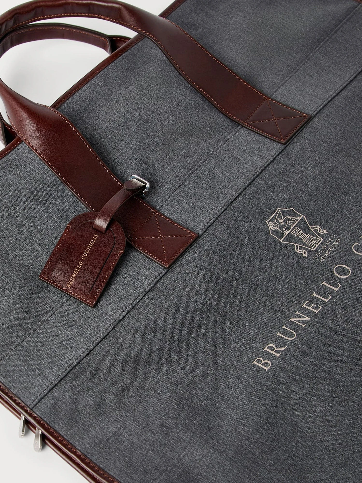 Technical fabric and leather garment bag.webp