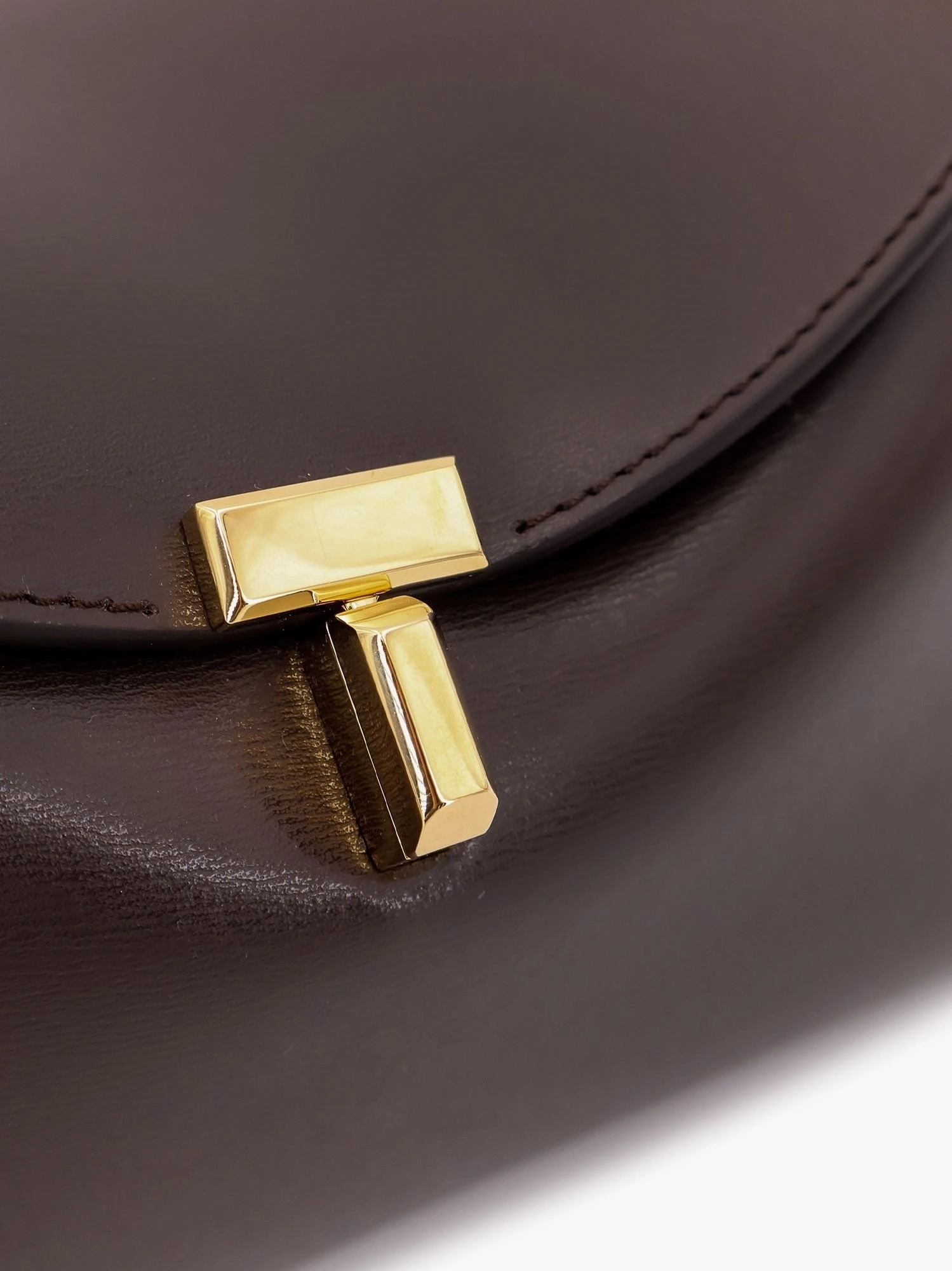 T-Lock clutch leather crossbody bag.webp