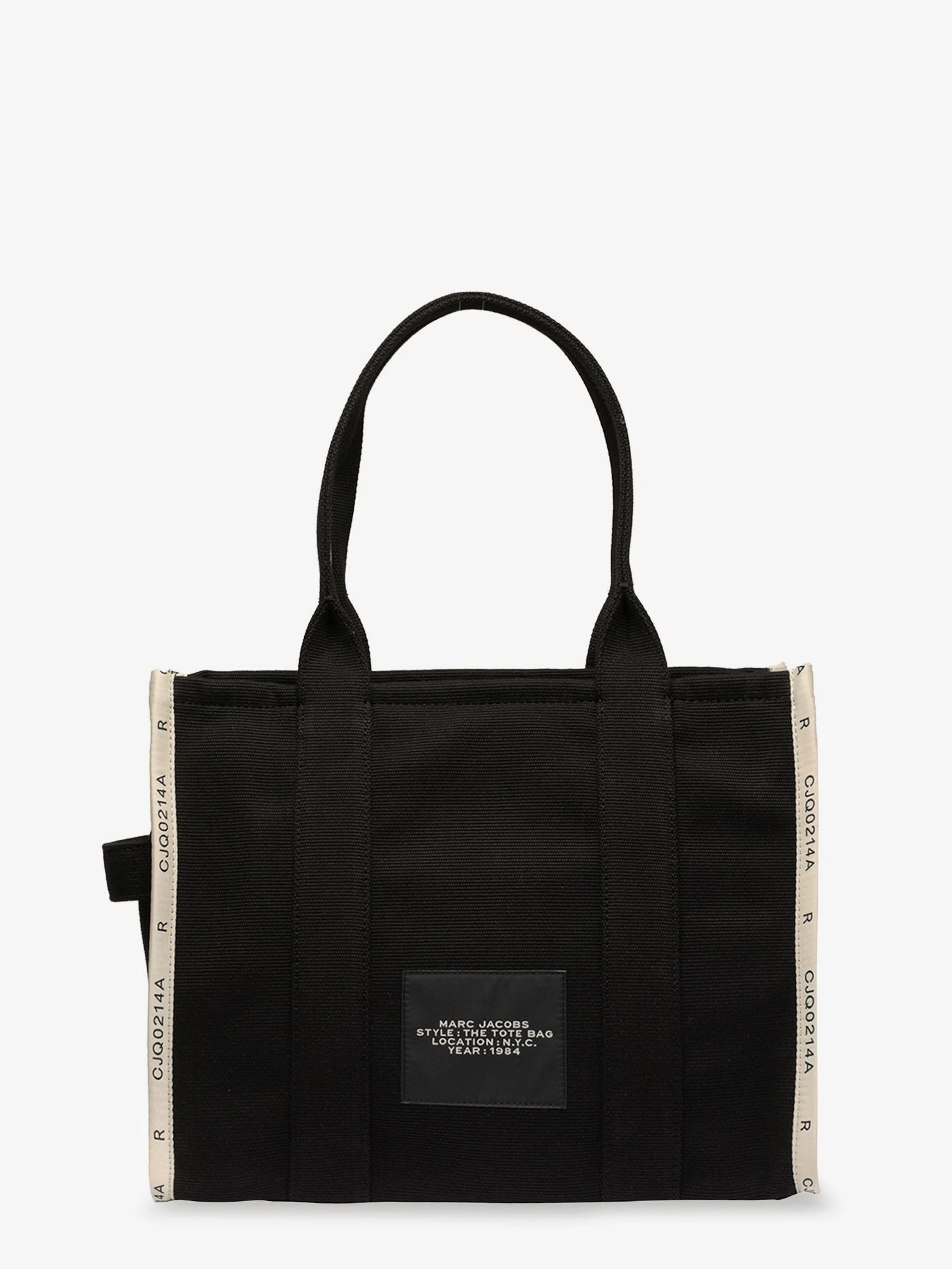 Traveler Tote canvas shopping bag with logo on the front.webp