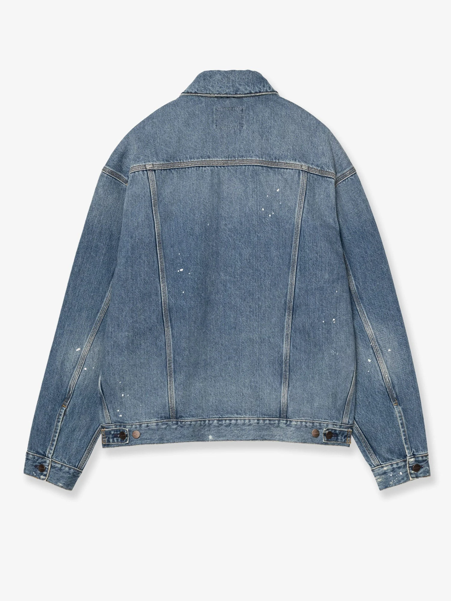 Blue denim jacket with distressed effect.webp