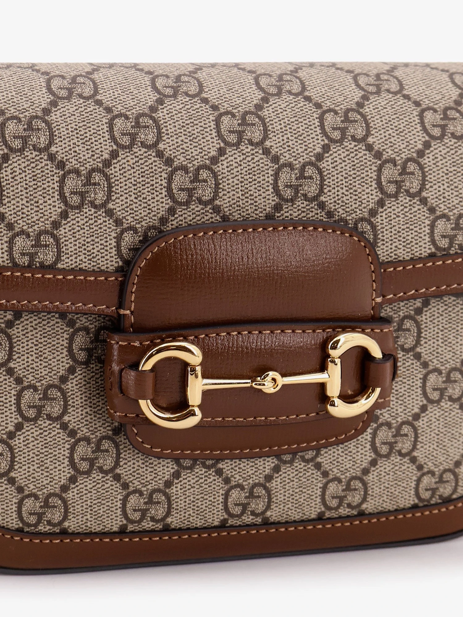 Coated canvas Gucci Horsebit 1955 crossbody bag with GG Supreme motif.webp