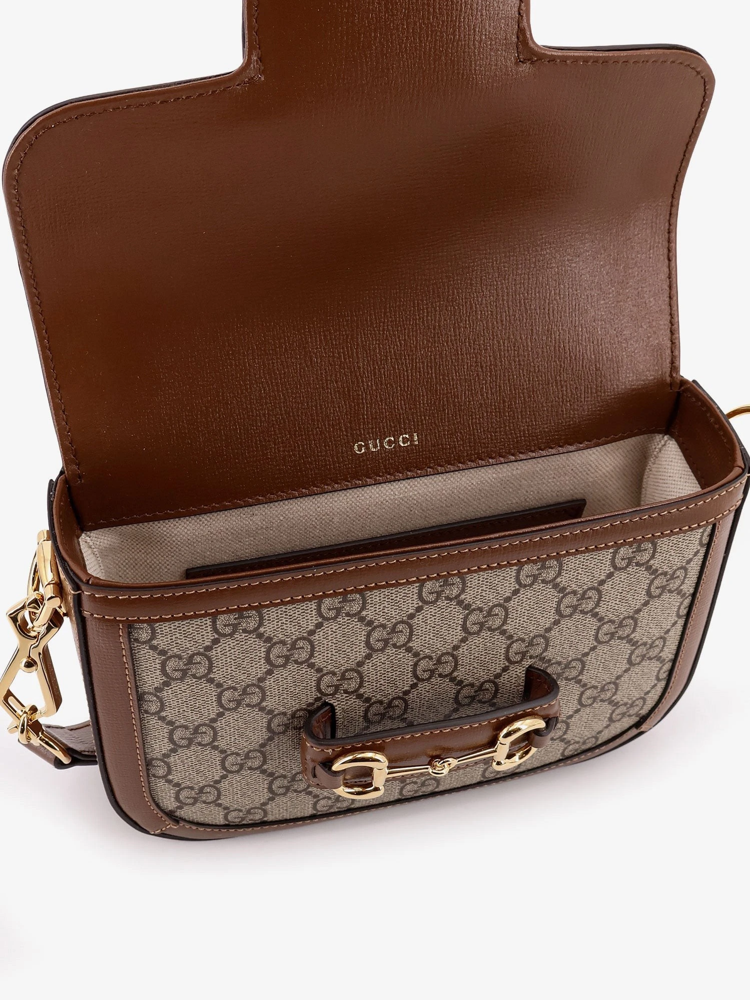 Coated canvas Gucci Horsebit 1955 crossbody bag with GG Supreme motif.webp