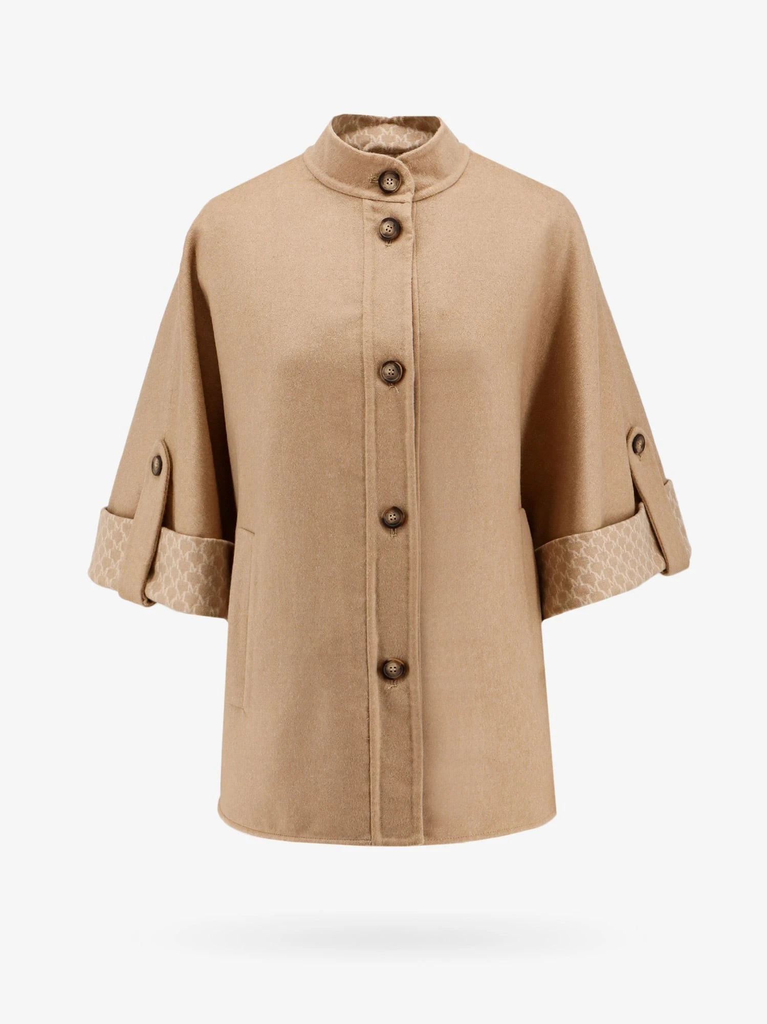 Virgin wool and cashmere cape wih pockets on the front.webp
