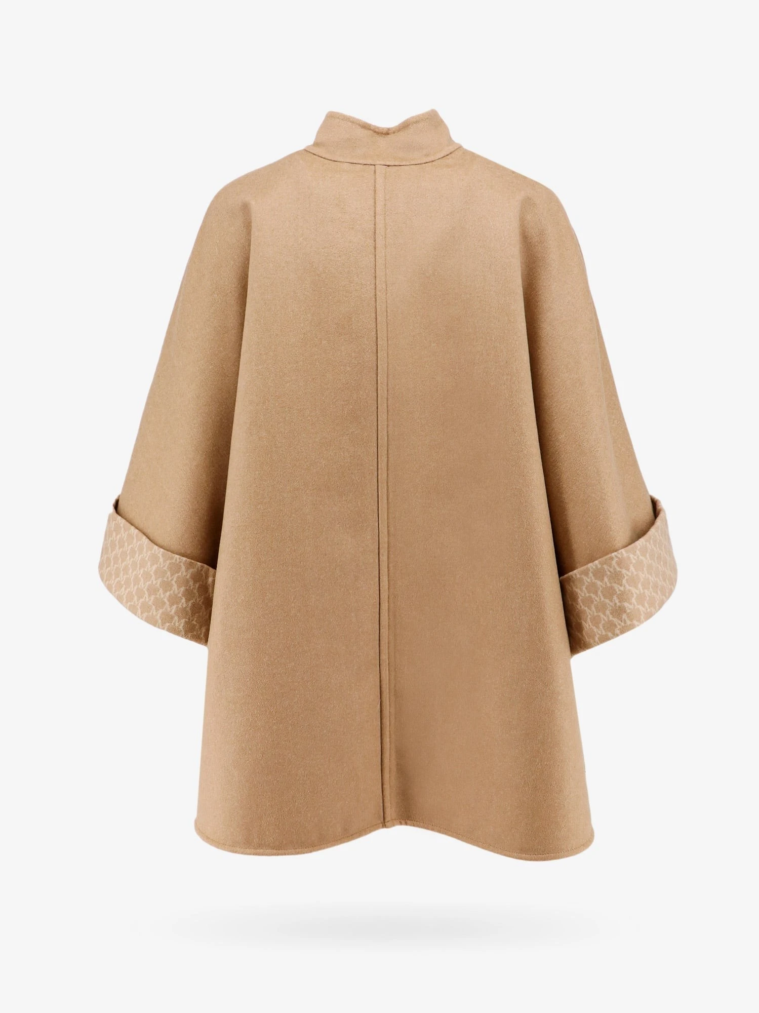 Virgin wool and cashmere cape wih pockets on the front.webp