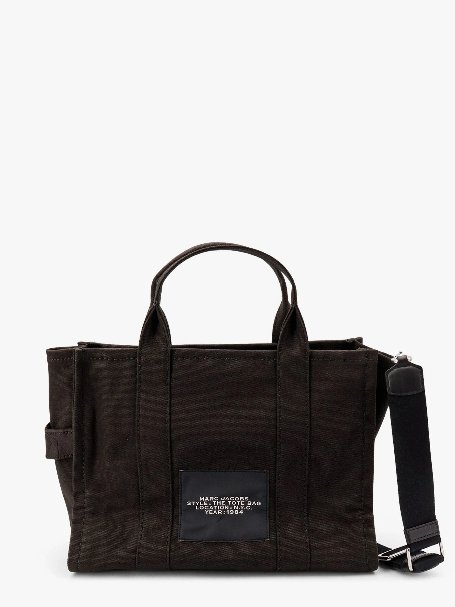The medium tote canvas crossbody bag.webp