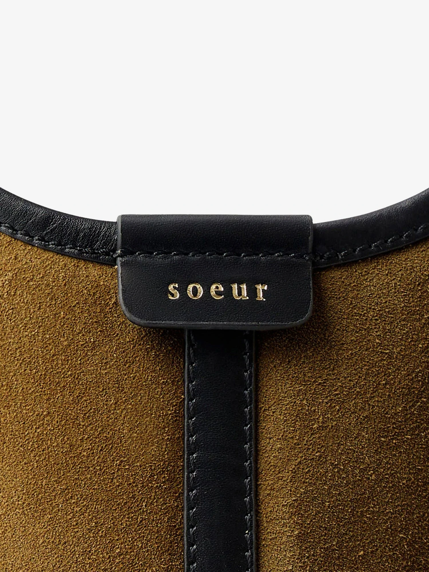 Douce suede and leather shoulder bag.webp