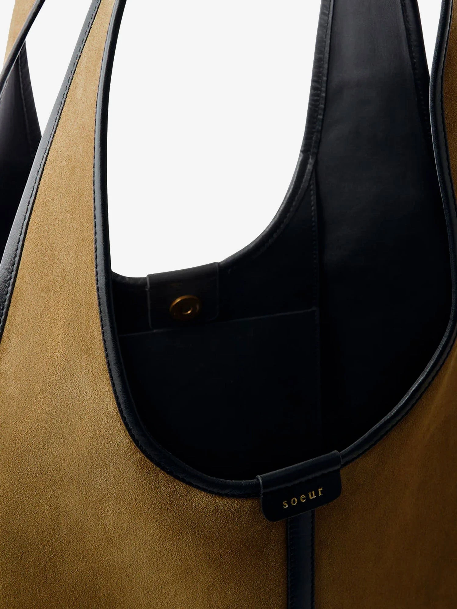 Douce suede and leather shoulder bag.webp