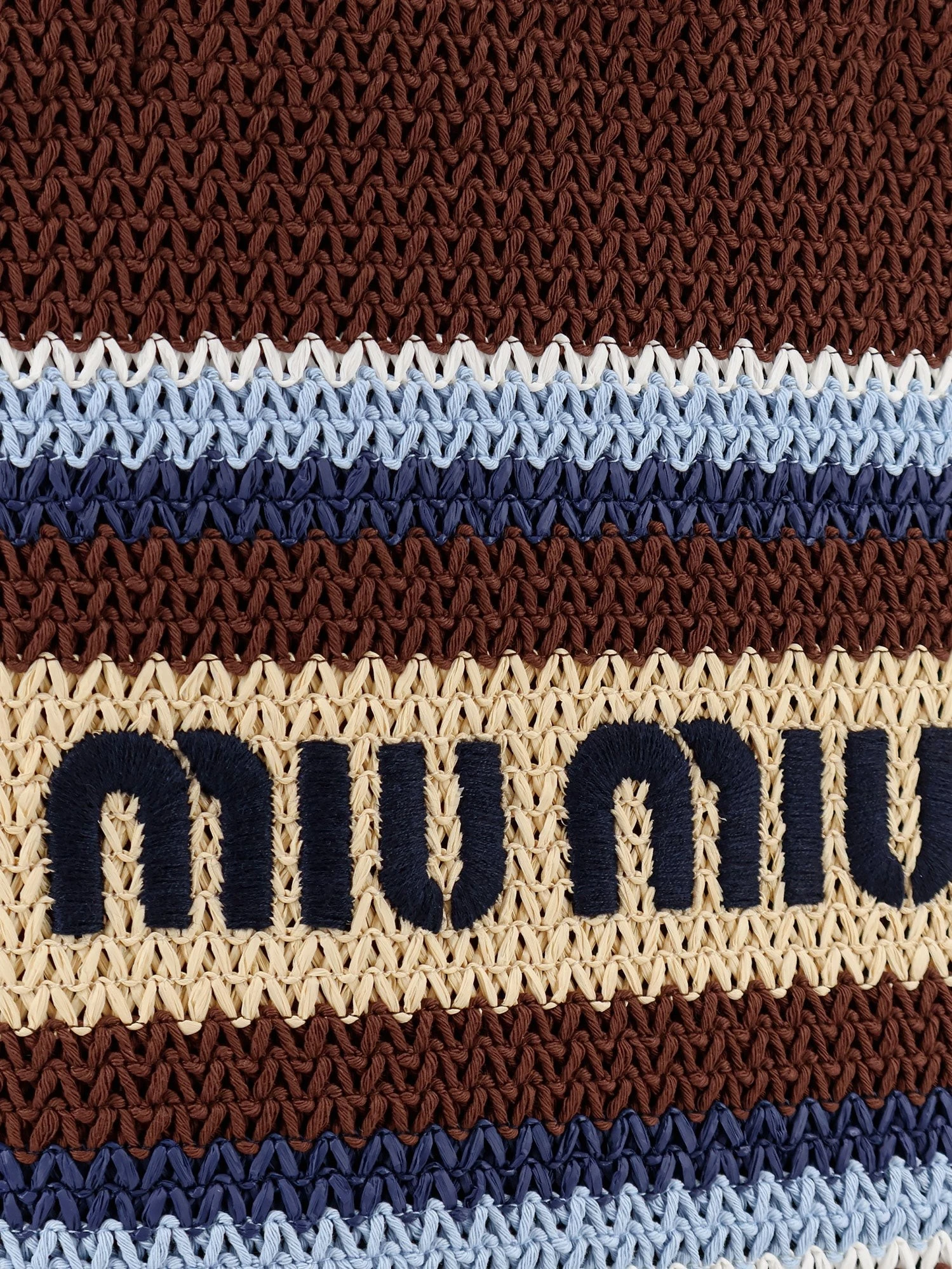 Knitted shopping bag with embroidered logo on the front.webp