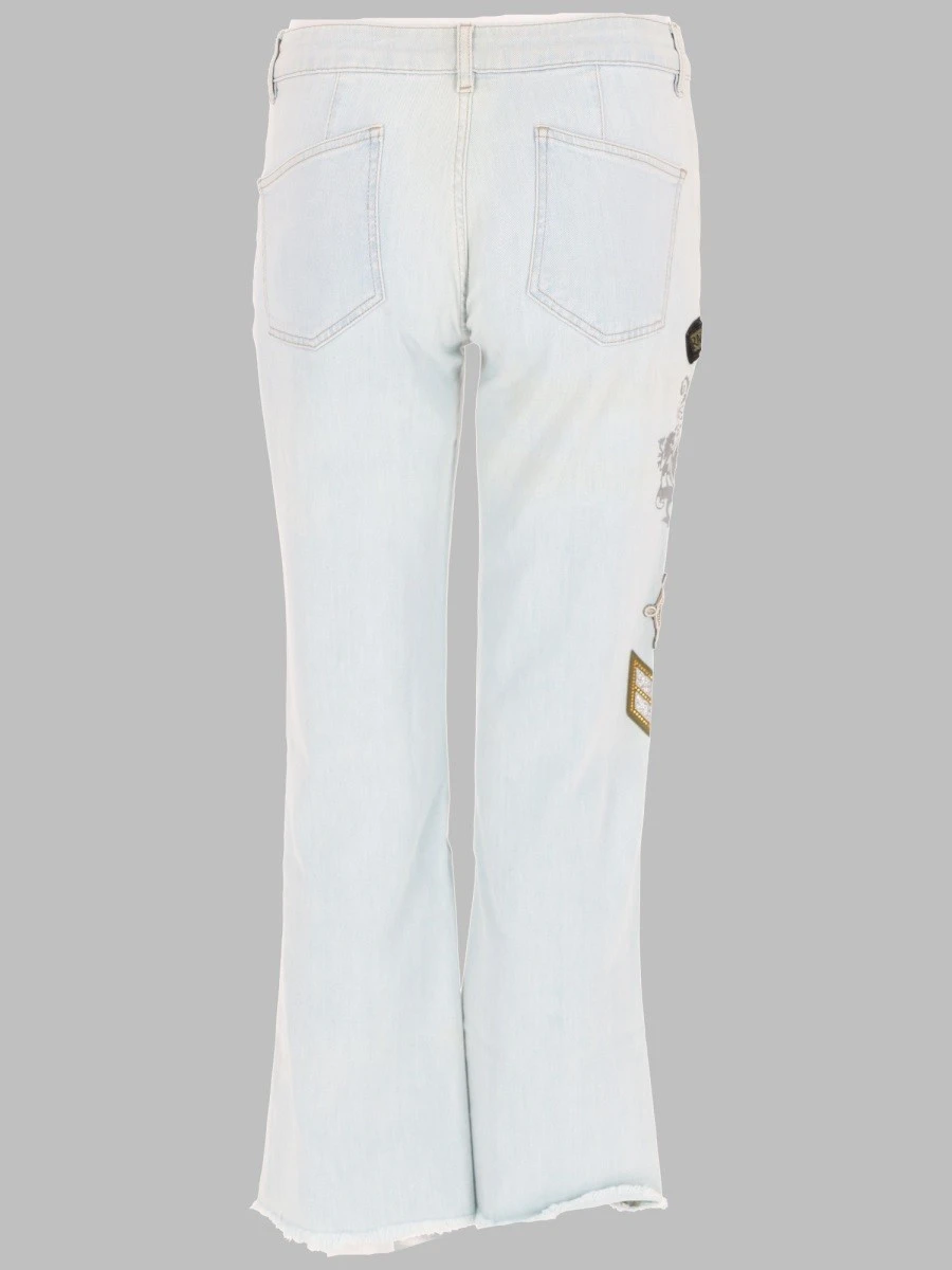 JEANS CON PATCH E STAMPA.webp